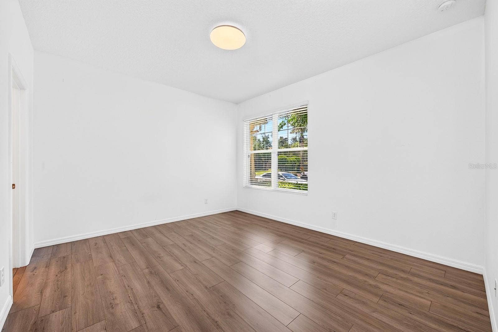 11429 BROWNSTONE STREET, Windermere, FL 34786 Main floor primary suite.