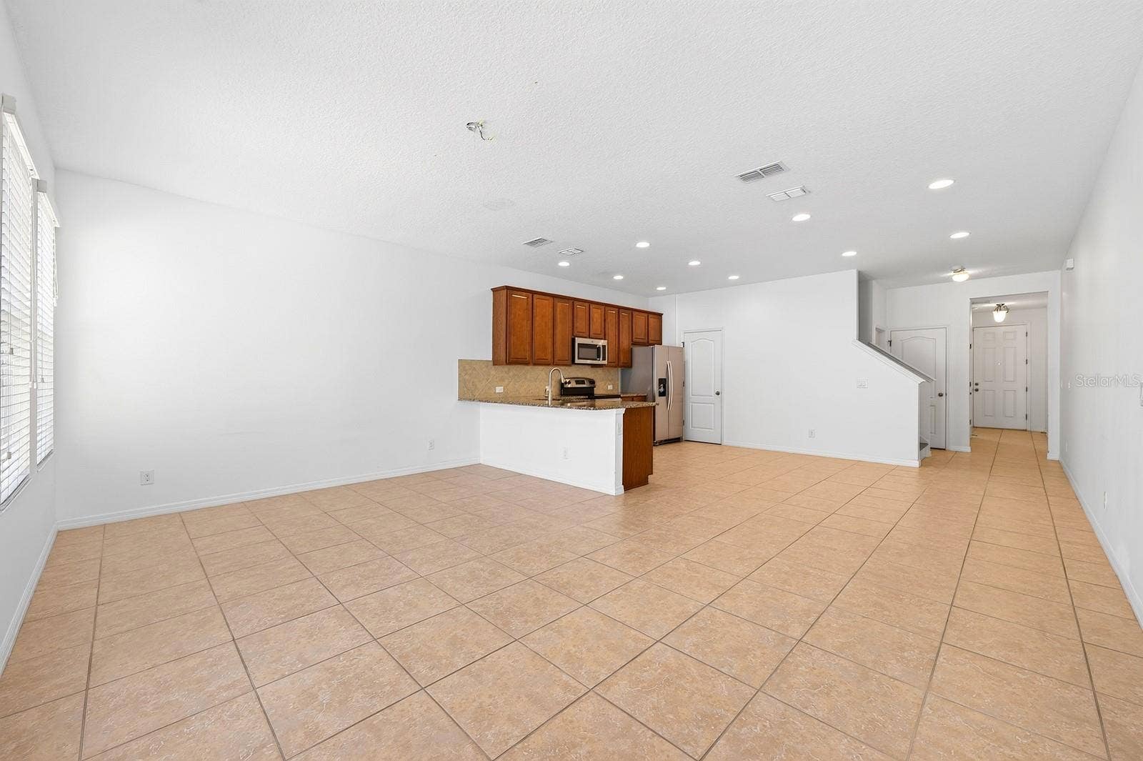 11429 BROWNSTONE STREET, Windermere, FL 34786 Open living and living.
