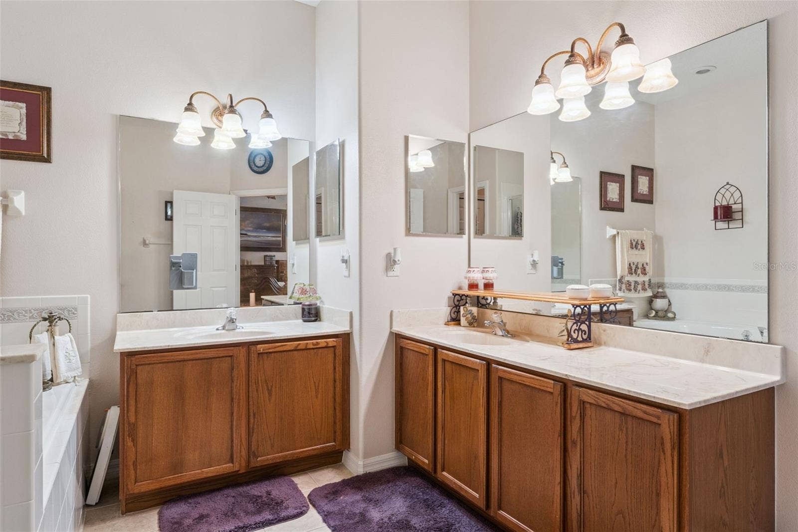9955 MEDALLION BLUFF LANE, Orlando, FL 32829 primary bathroom features dual vanities