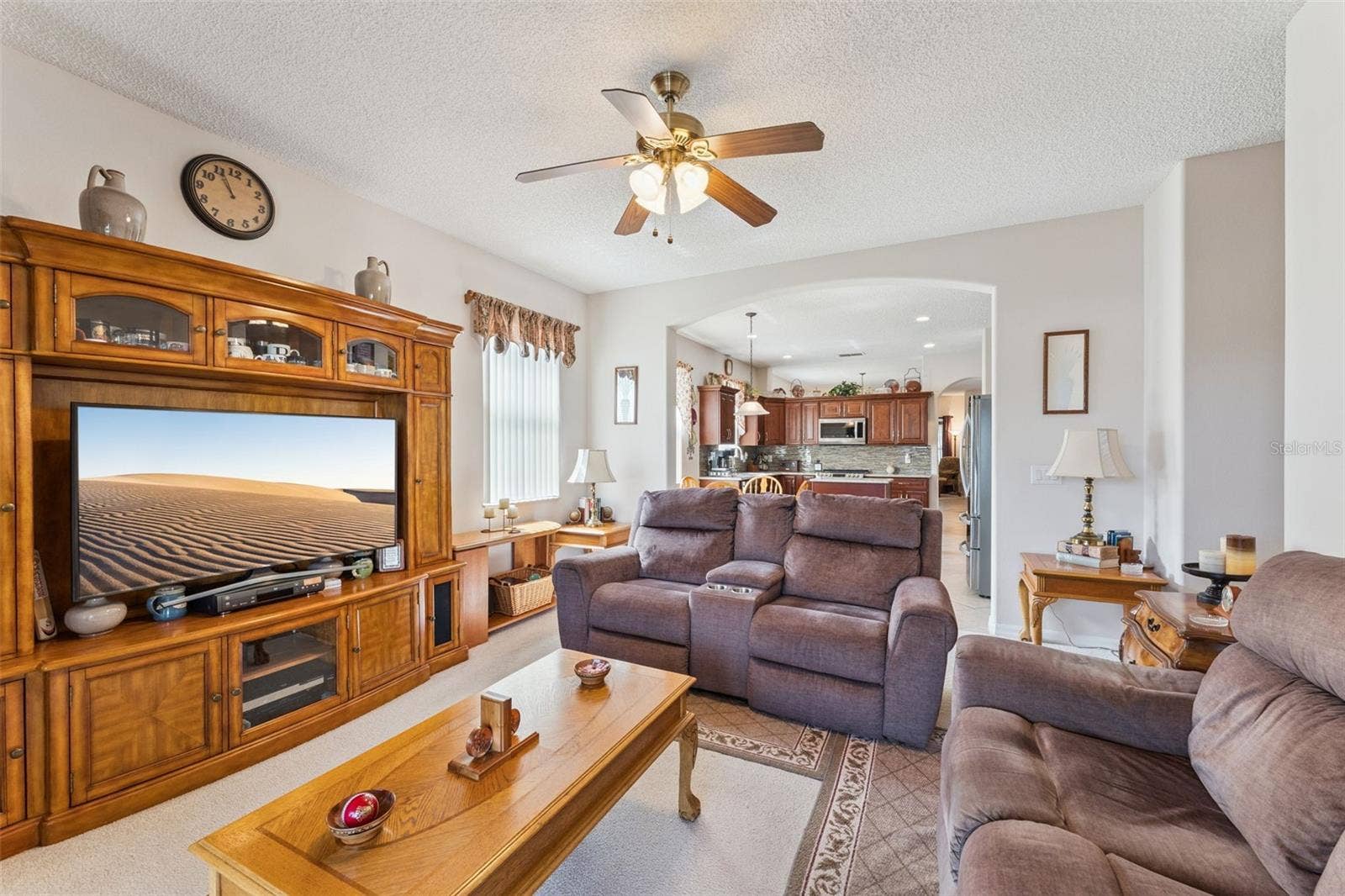9955 MEDALLION BLUFF LANE, Orlando, FL 32829 Family Room with Kitchen View