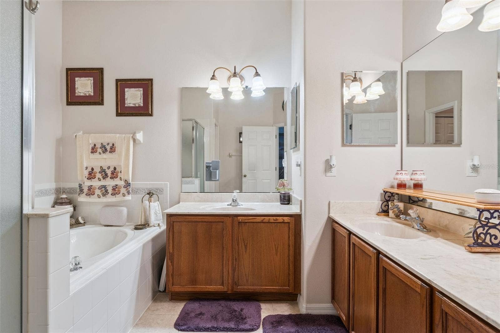 9955 MEDALLION BLUFF LANE, Orlando, FL 32829 Primary Bathroom with separate sinks and generous counter space