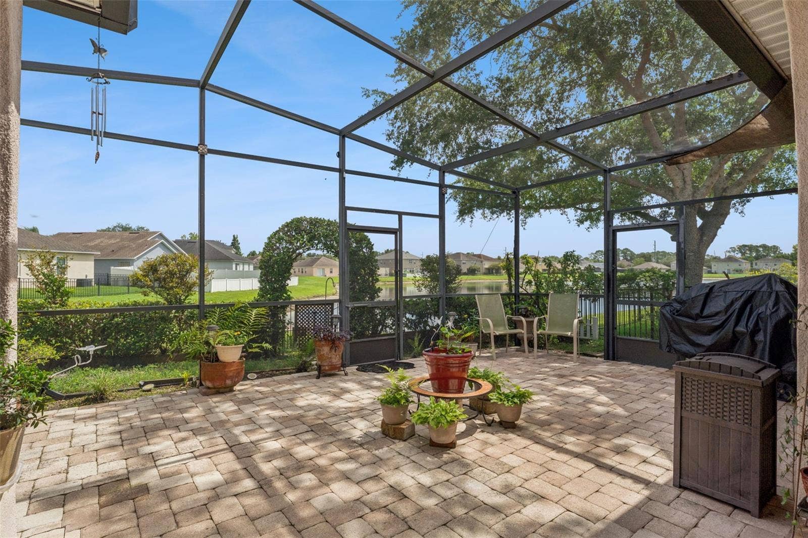 9955 MEDALLION BLUFF LANE, Orlando, FL 32829 Patio View of the Community Lake