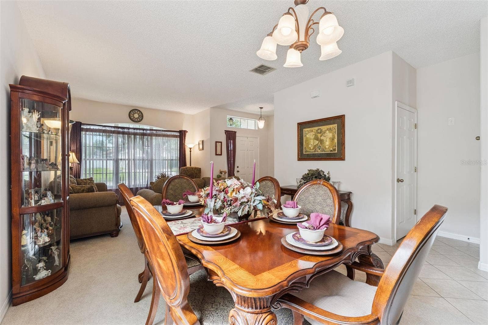 9955 MEDALLION BLUFF LANE, Orlando, FL 32829 Dining Room with Living Room View