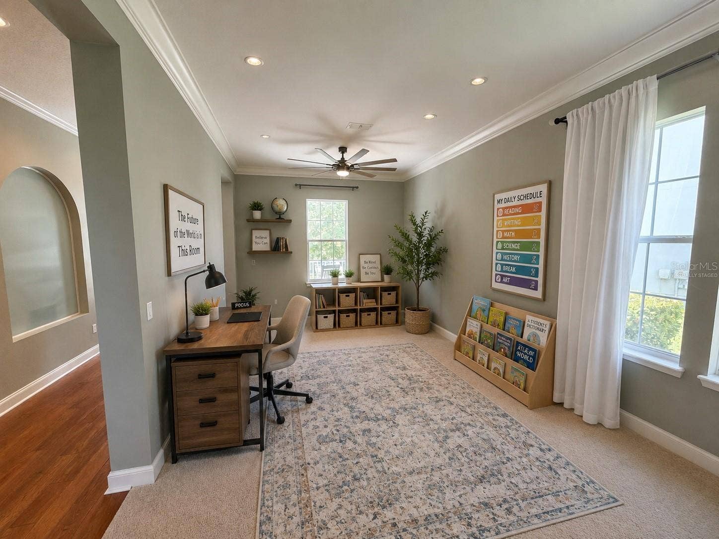 807 OAK SHADOWS ROAD, Celebration, FL 34747 Front entry room of home (Virtually staged as home school / office space)