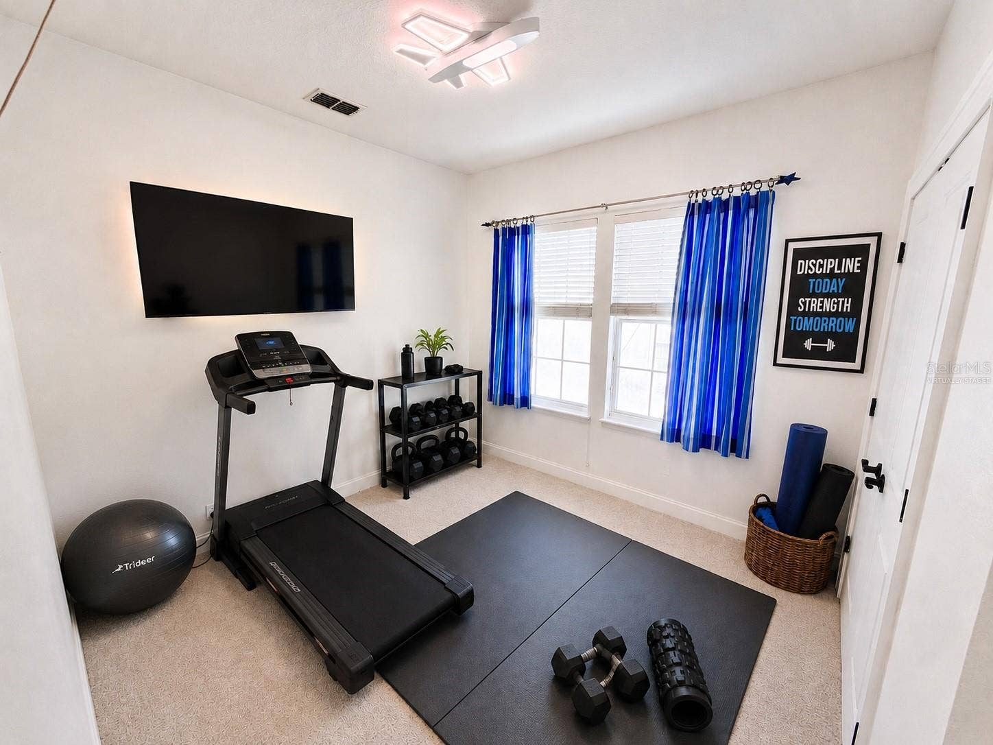 807 OAK SHADOWS ROAD, Celebration, FL 34747 Fourth bedroom upstairs (virtually staged as gym - has closet)