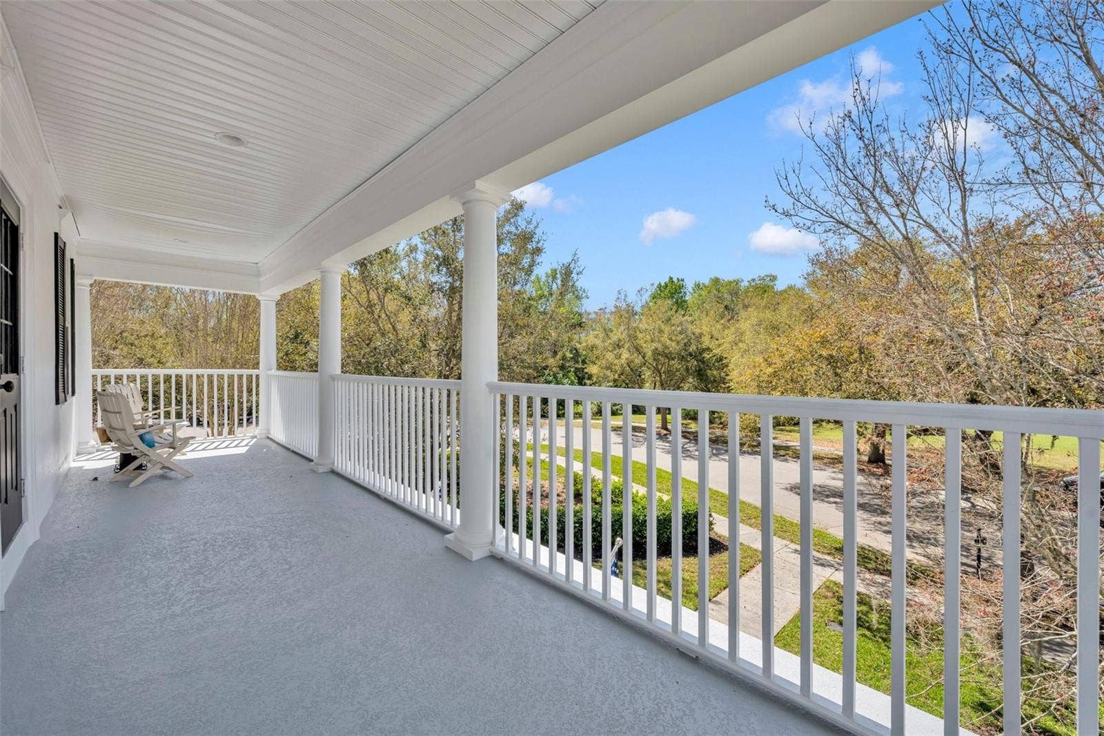 807 OAK SHADOWS ROAD, Celebration, FL 34747 View from second floor primary bedroom balcony.