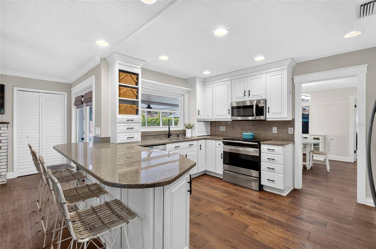 722 S RANGER BOULEVARD, Winter Park, FL 32792 Kitche With Bar Stools