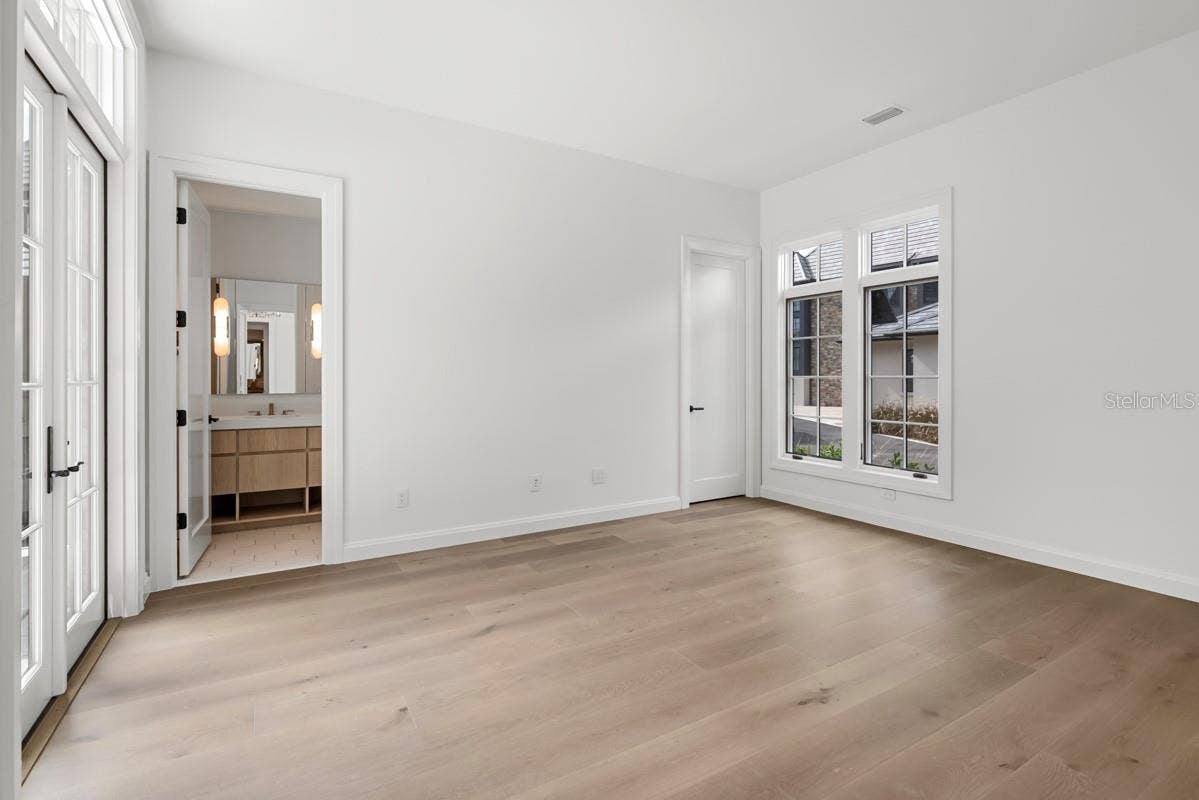 10335 WINTER SPARKLE CIRCLE, Golden Oak, FL 32836 First-floor guest suite with en-suite bath and access to outdoor courtyard