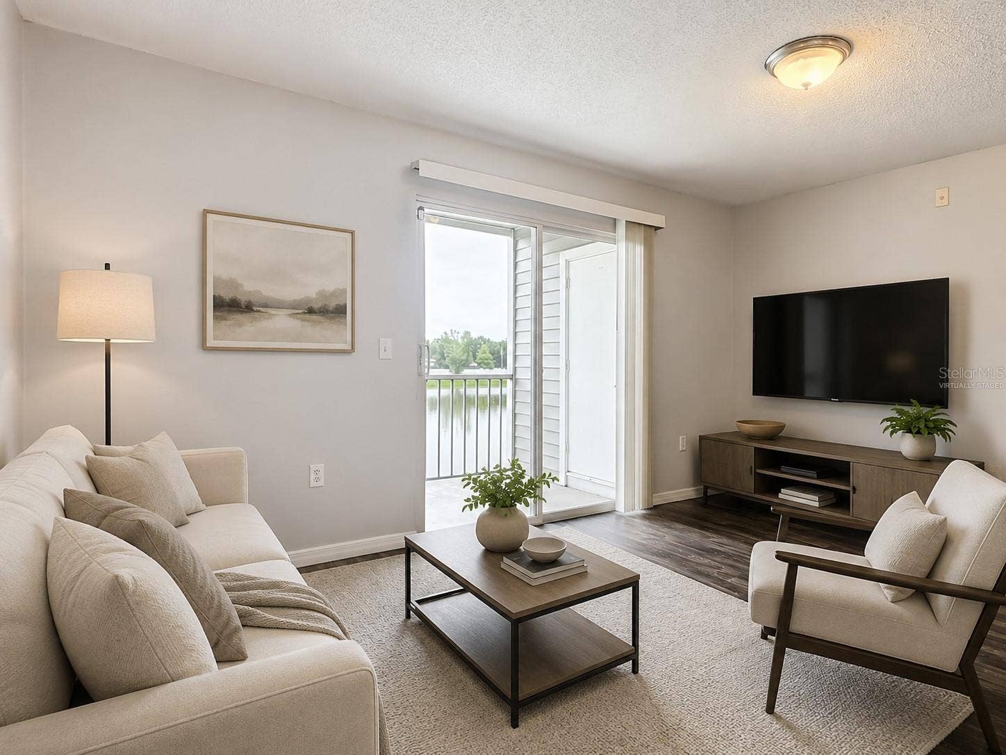 1229 BERMUDA LAKES LANE, #206, Kissimmee, FL 34741 Virtually Staged: Living room