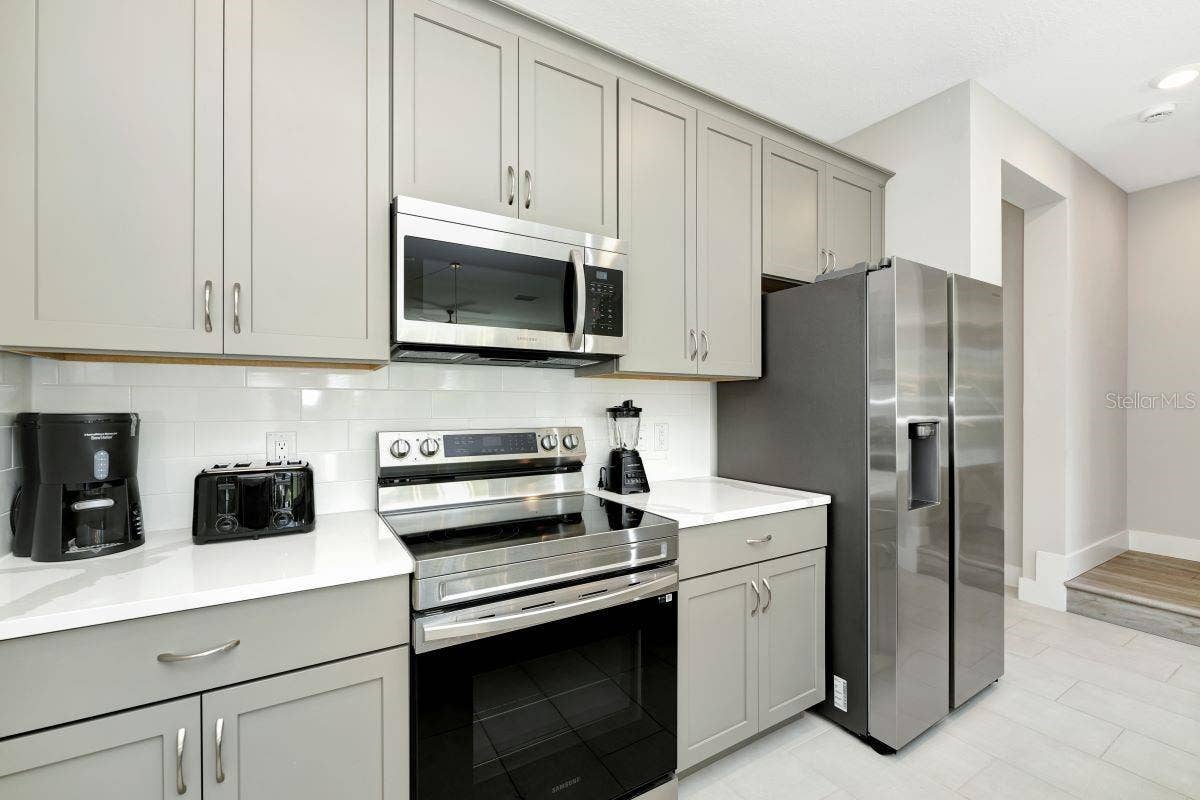7917 NW SPECTRUM DRIVE, Kissimmee, FL 34747 Kitchen 2