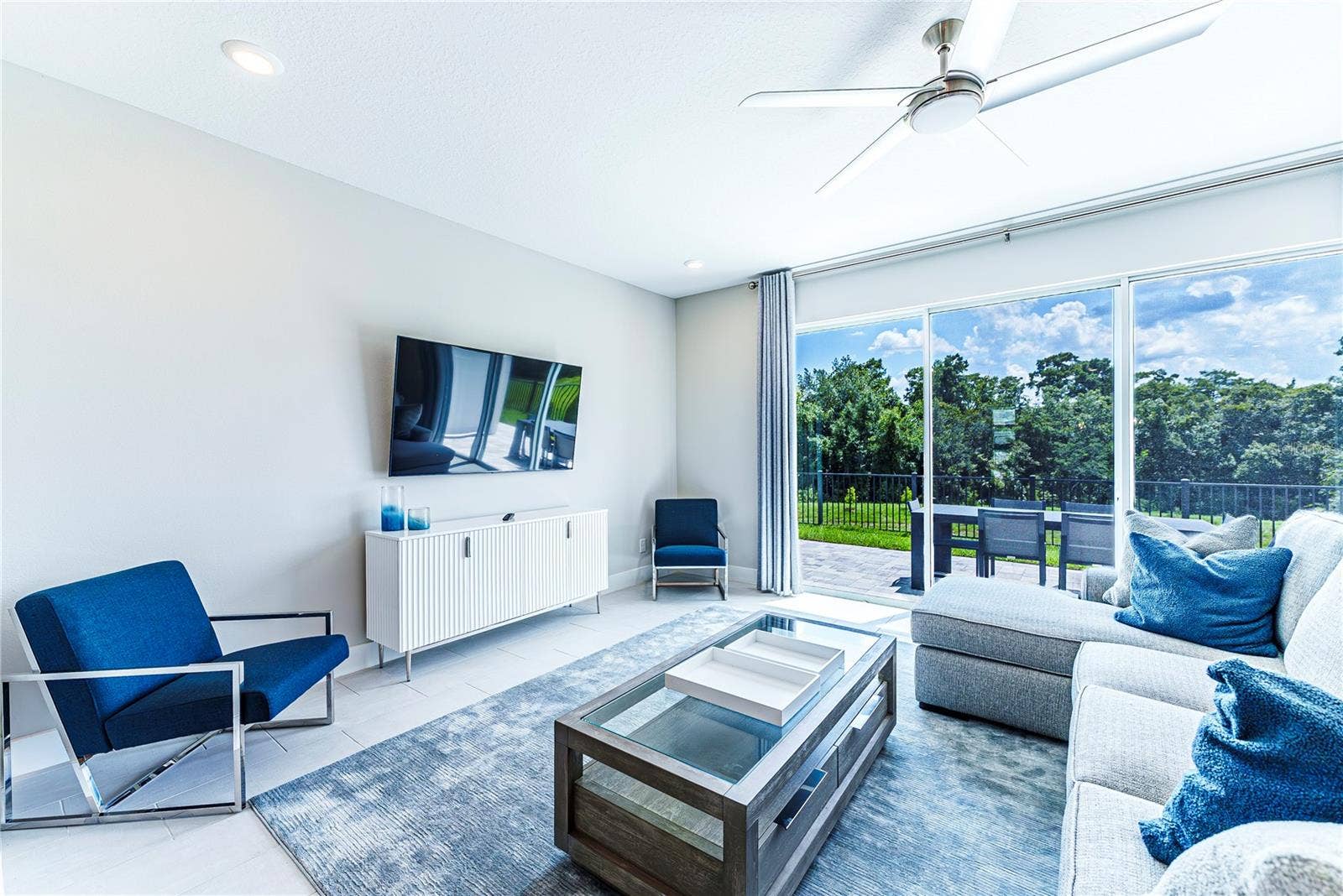 7917 NW SPECTRUM DRIVE, Kissimmee, FL 34747 Living and outdoor patio