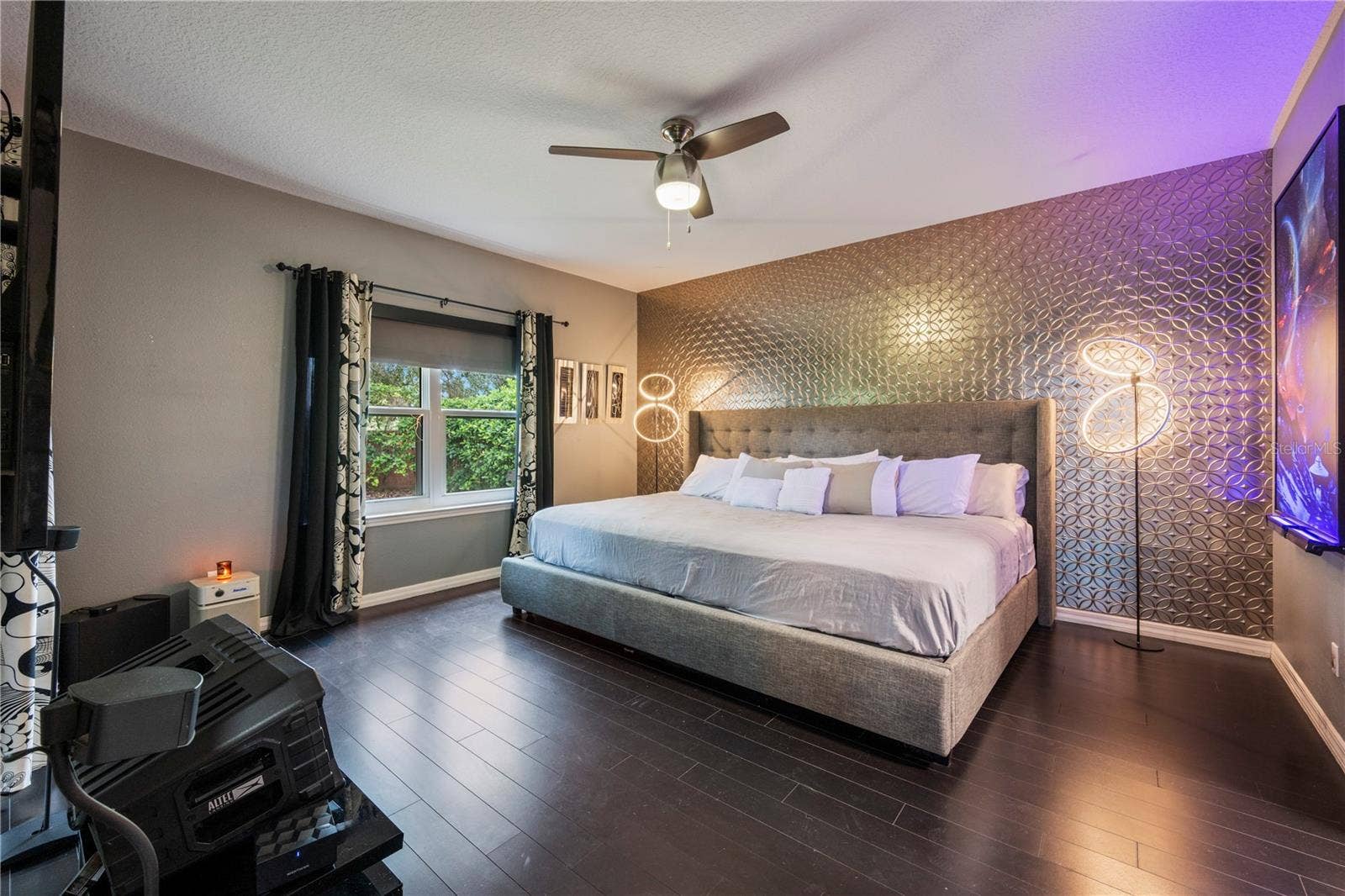 15604 GRANLUND STREET, Winter Garden, FL 34787 Spacious Primary Suite featuring custom designer accent wall.