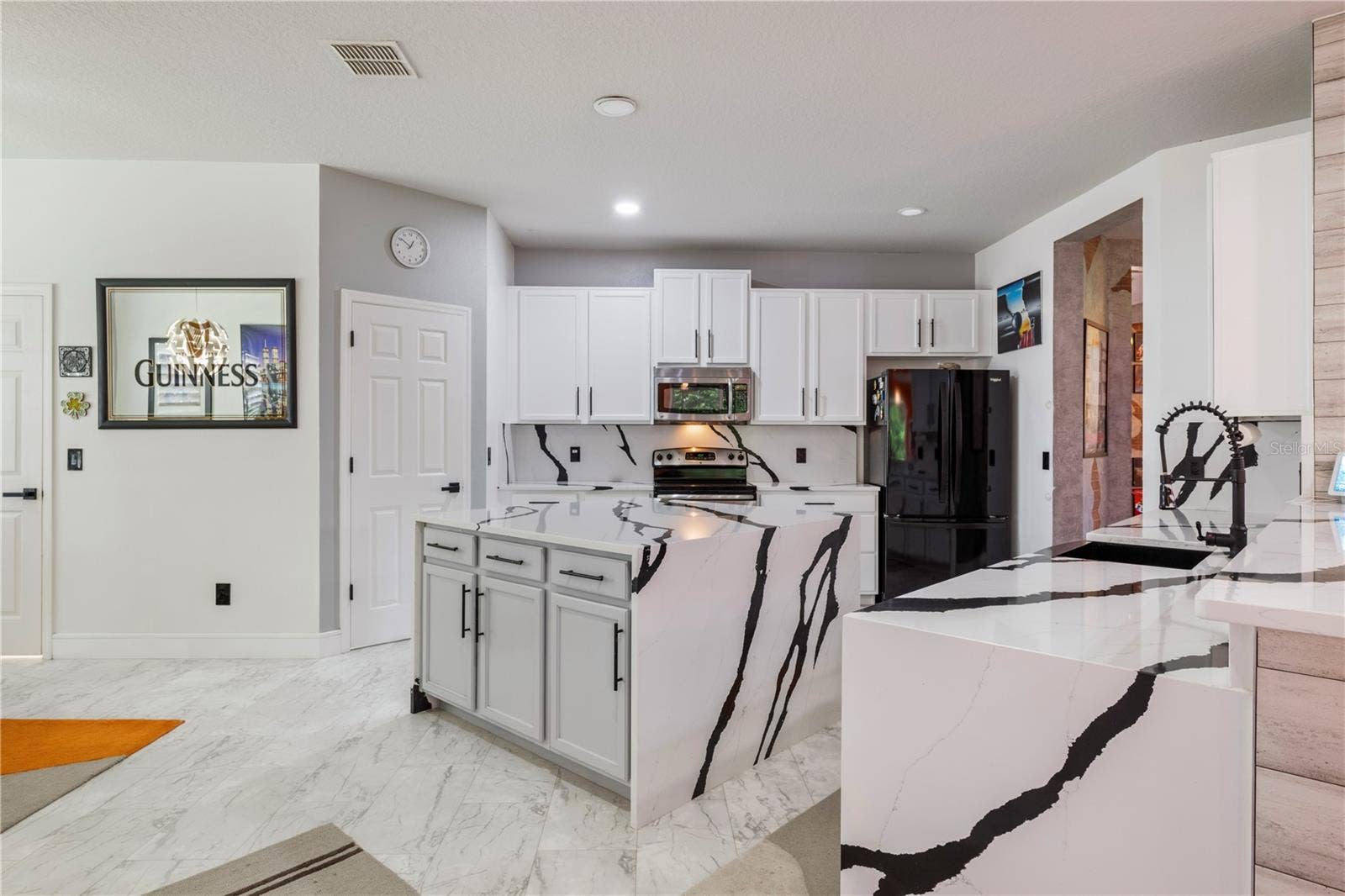 15604 GRANLUND STREET, Winter Garden, FL 34787 Gorgeous quartz waterfall edges!