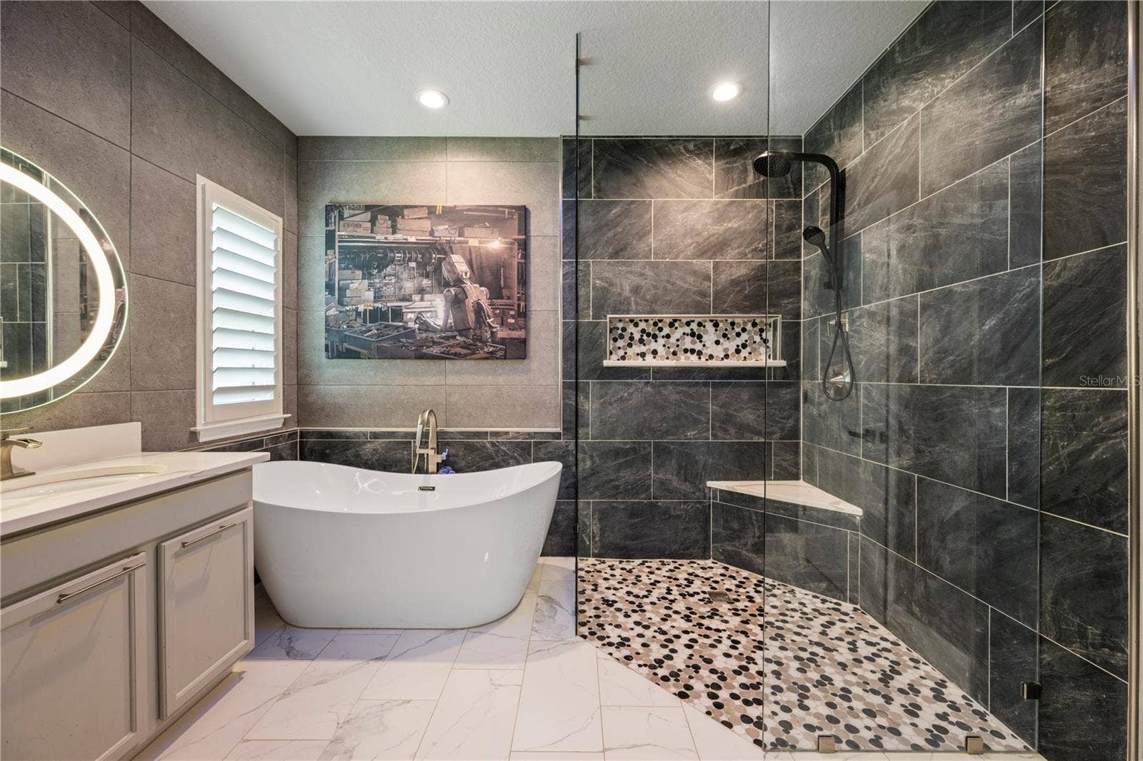 15604 GRANLUND STREET, Winter Garden, FL 34787 Private retreat with a custom designer accent wall and dual walk-in closets.