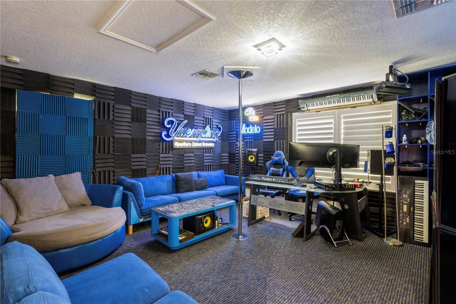 15604 GRANLUND STREET, Winter Garden, FL 34787 Private upstairs, Soundproofed bonus room designed as a DJ studio, offering a creative space for music, media, or hobbies.