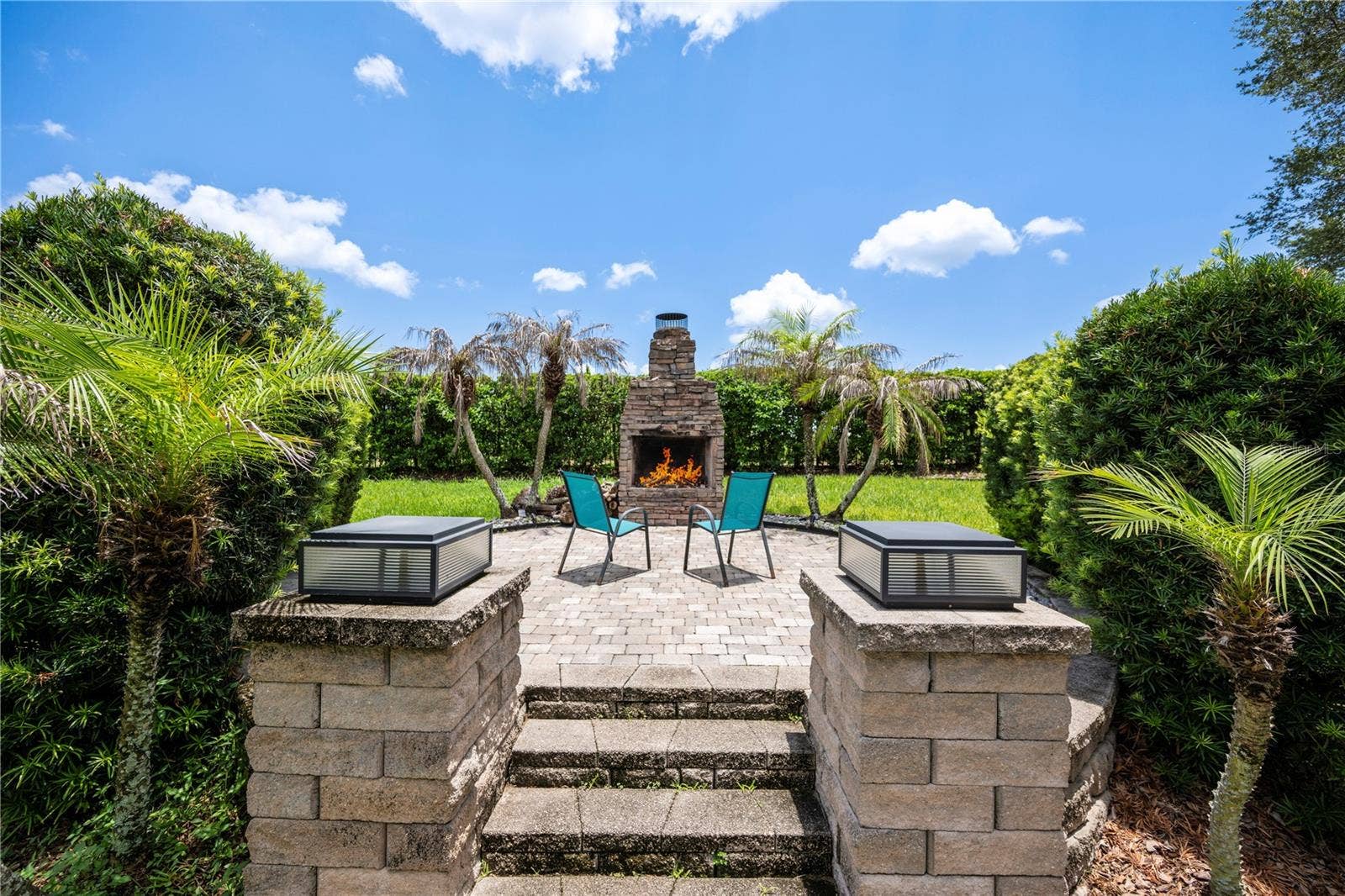 15604 GRANLUND STREET, Winter Garden, FL 34787 Create unforgettable evenings under the stars by the outdoor fireplace.