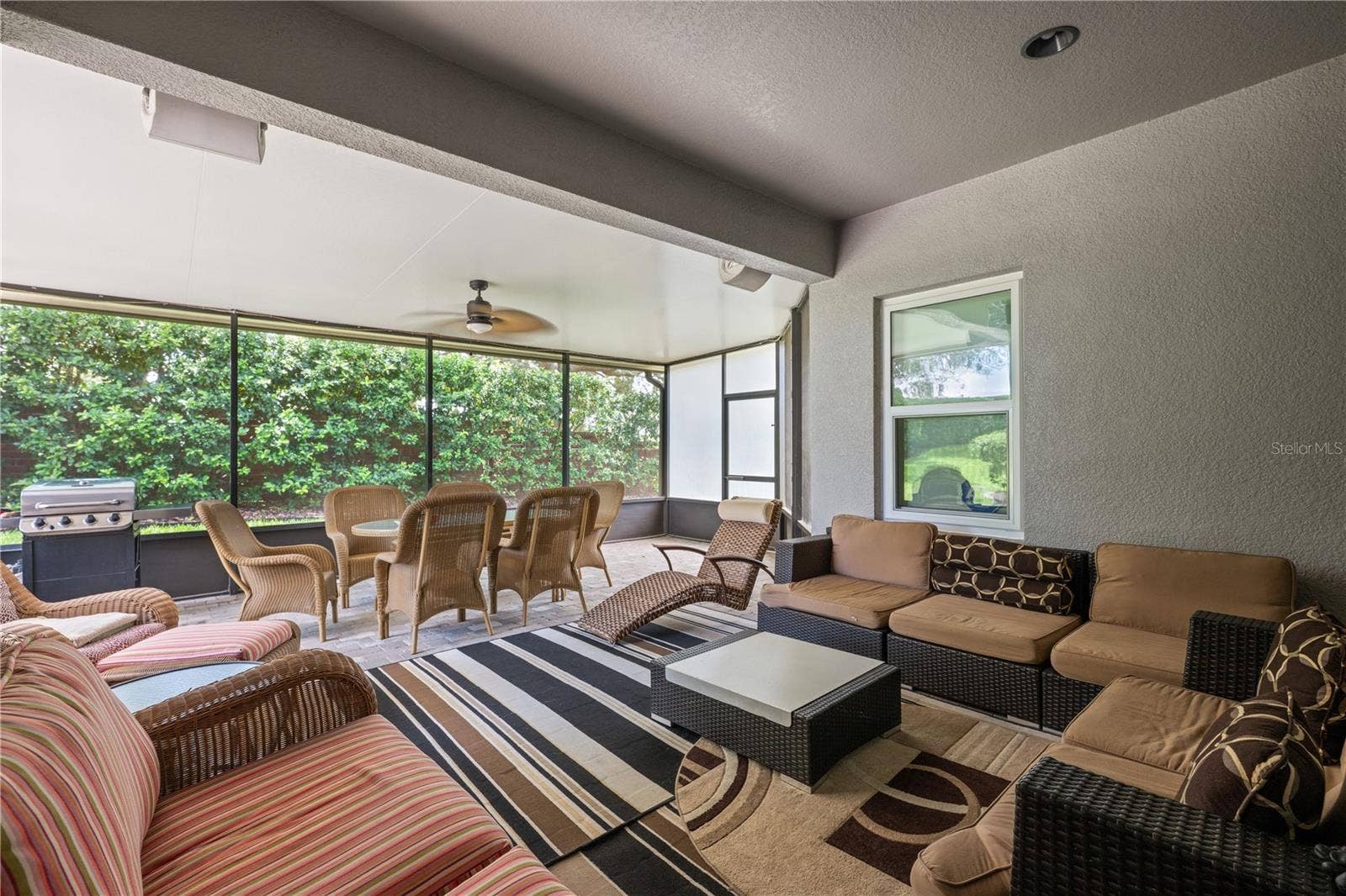 15604 GRANLUND STREET, Winter Garden, FL 34787 Enjoy year-round Florida living from the oversized covered and screened lanai with an upgraded insulated roof.