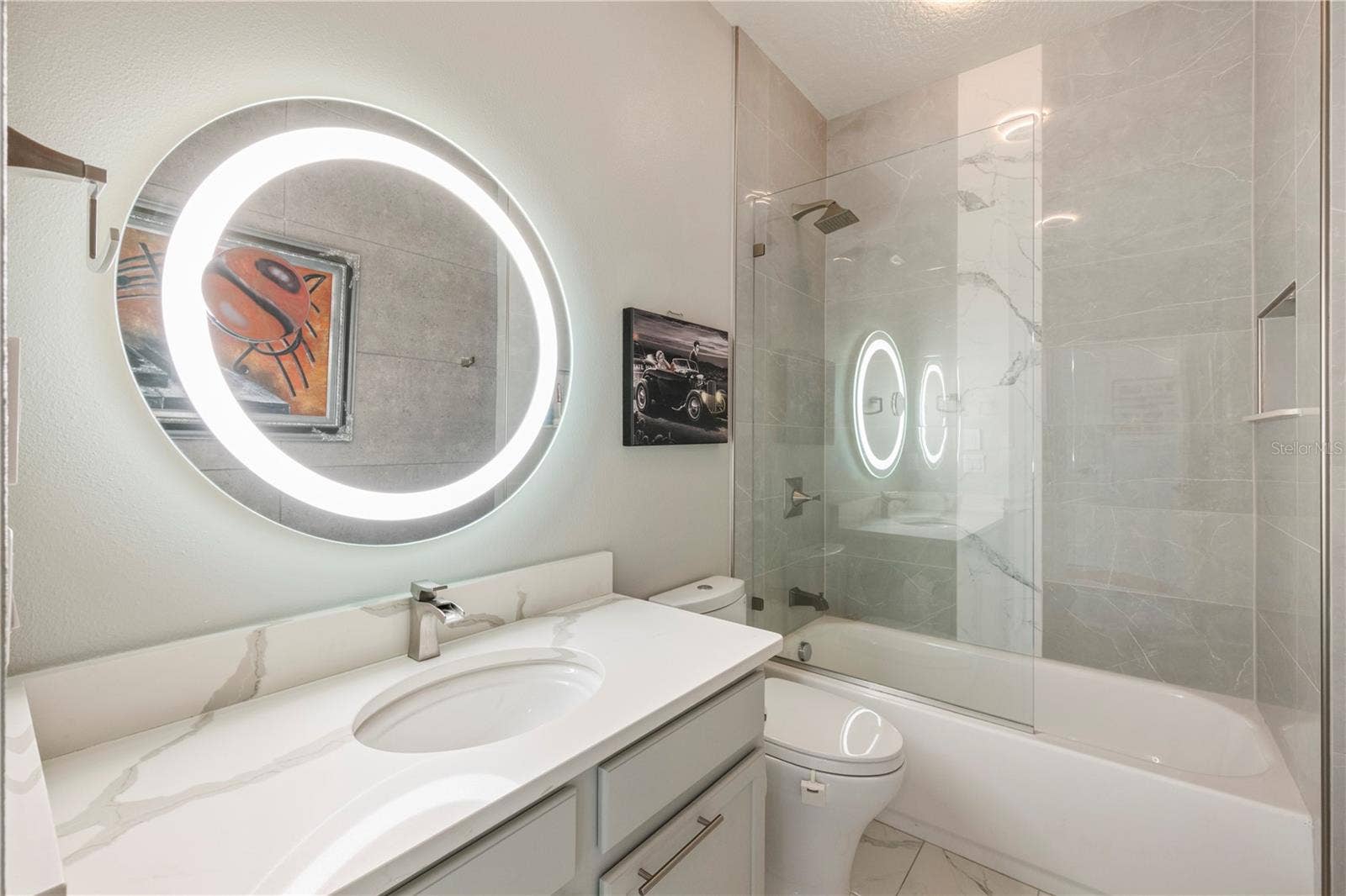15604 GRANLUND STREET, Winter Garden, FL 34787 Bathroom 3 - Renovated tile and lighting.