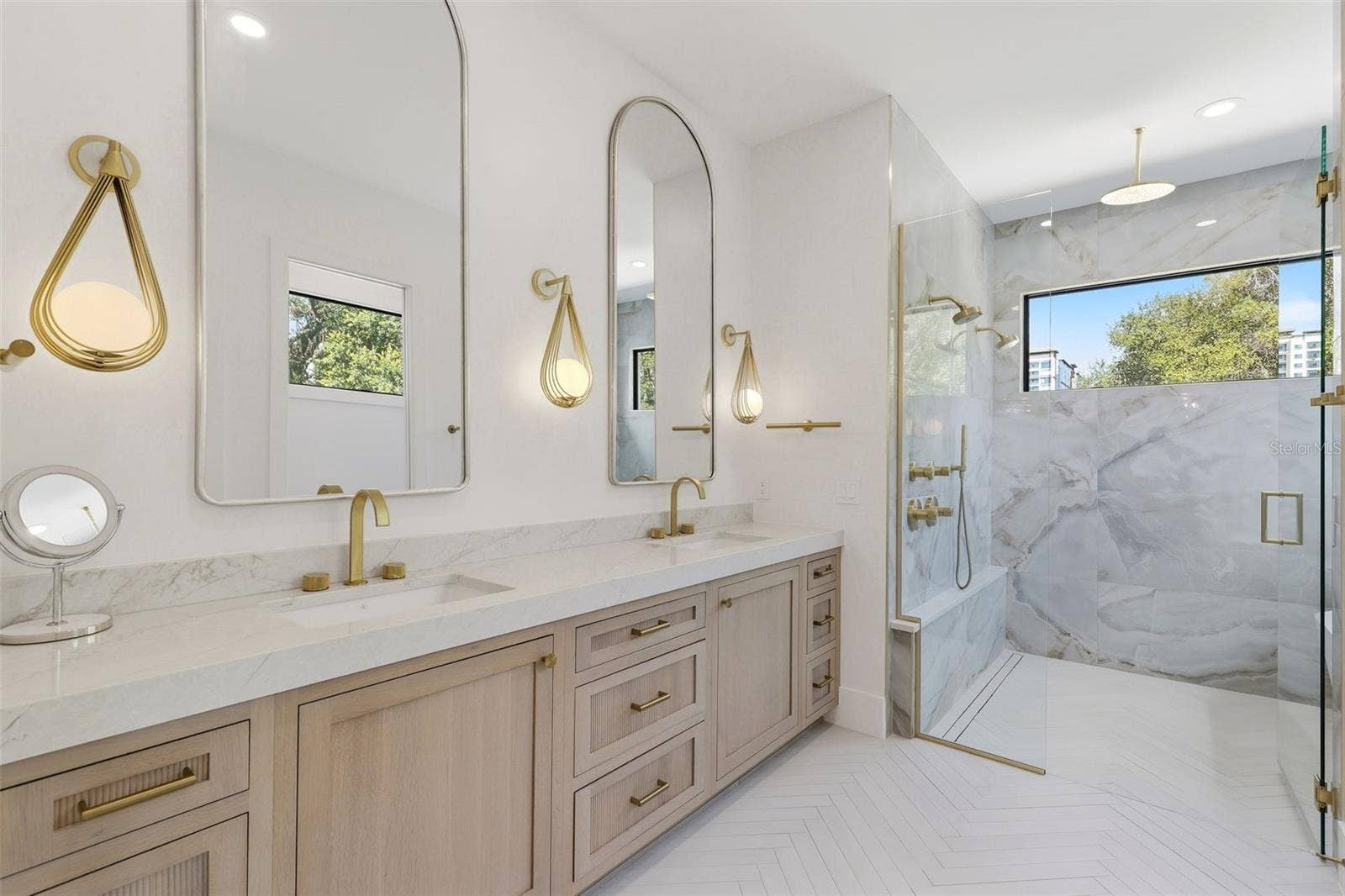 809 E CHURCH STREET, Orlando, FL 32801 Primary bathroom with dual sinks, custom cabinets and designer lighting