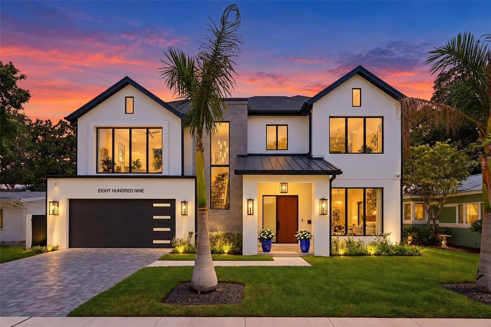 809 E CHURCH STREET, Orlando, FL 32801 The roof combines architectural shingles with standing-seam metal accents