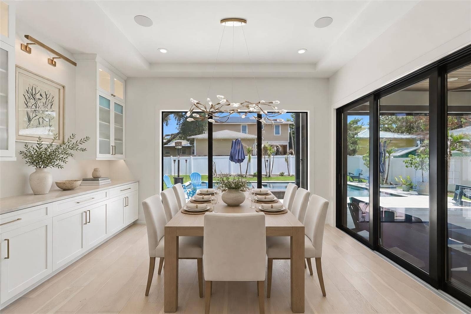 809 E CHURCH STREET, Orlando, FL 32801 Dining area with custom cabinetry and designer lighting