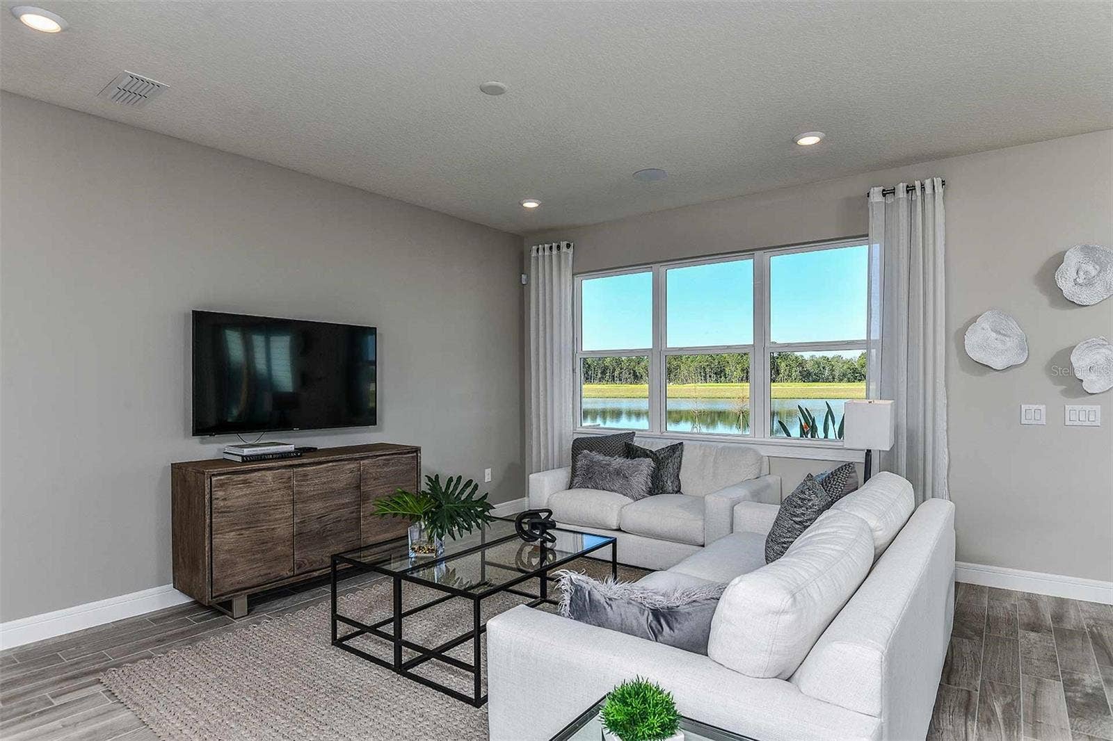 5038 DANCY LANE, St Cloud, FL 34772 Model Home Design Only. Pictures and furnishings are for illustrative purposes only. Elevations, colors and options may vary. Furniture is for model home staging only.