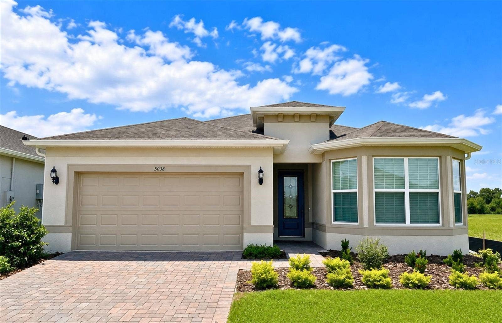5038 DANCY LANE, St Cloud, FL 34772 Actual home photo. Colors, finishes, textures and options may appear differently in person due to variations in monitors and viewing devices.