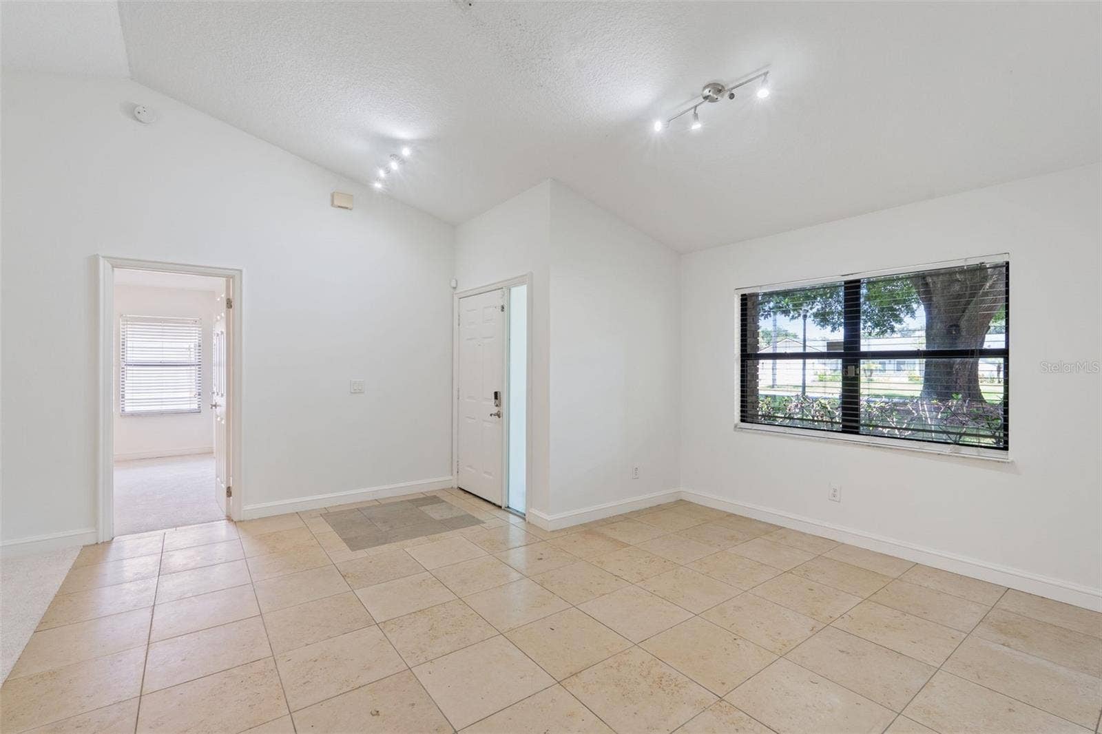 9433 PALM TREE DRIVE, Windermere, FL 34786 Dining room with view of front yard