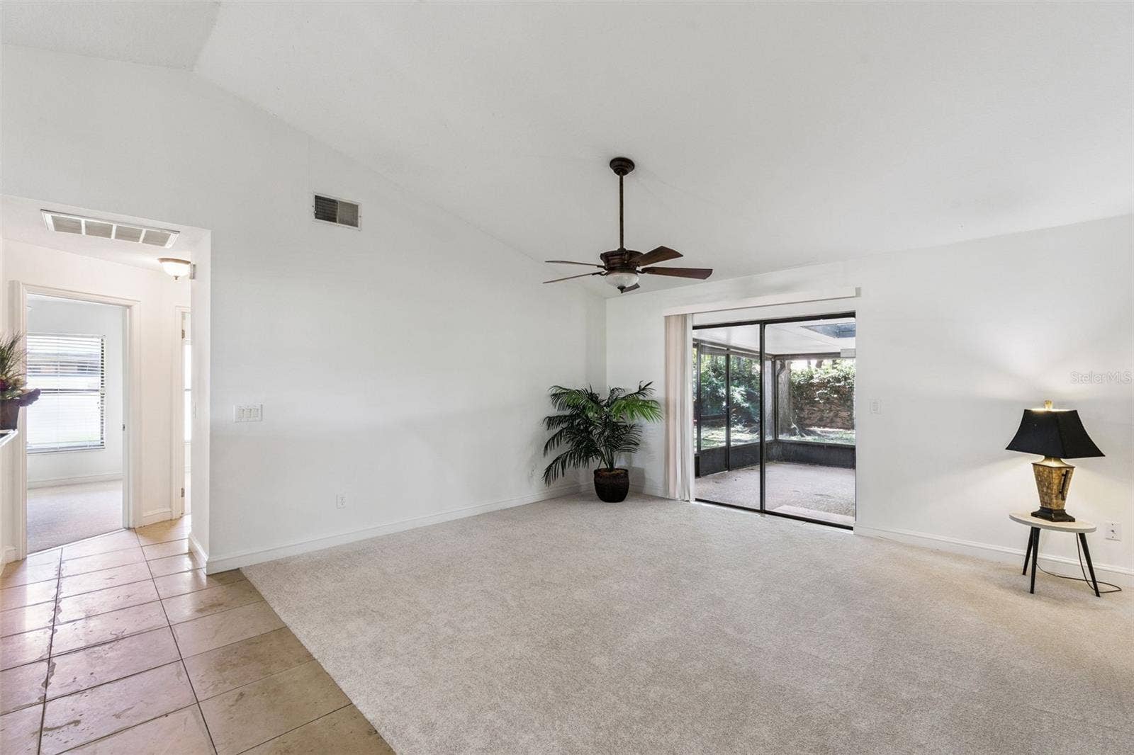 9433 PALM TREE DRIVE, Windermere, FL 34786 Family Room with Sliding Doors to Patio