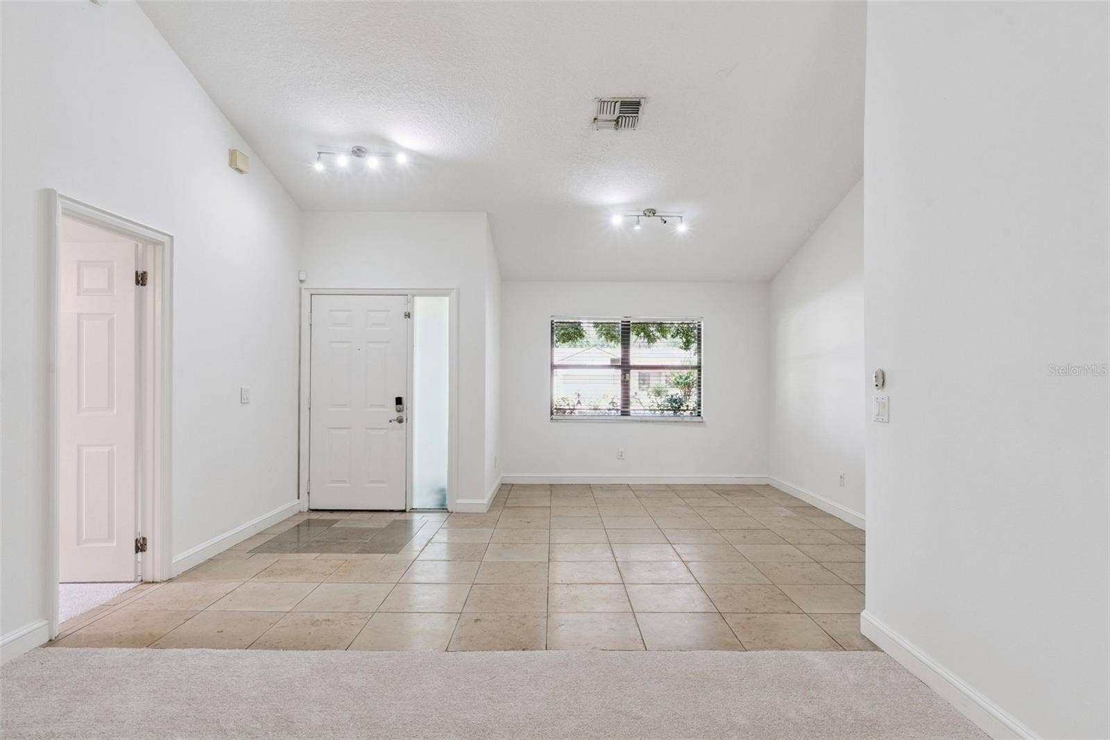 9433 PALM TREE DRIVE, Windermere, FL 34786 Dining Room and Front Door