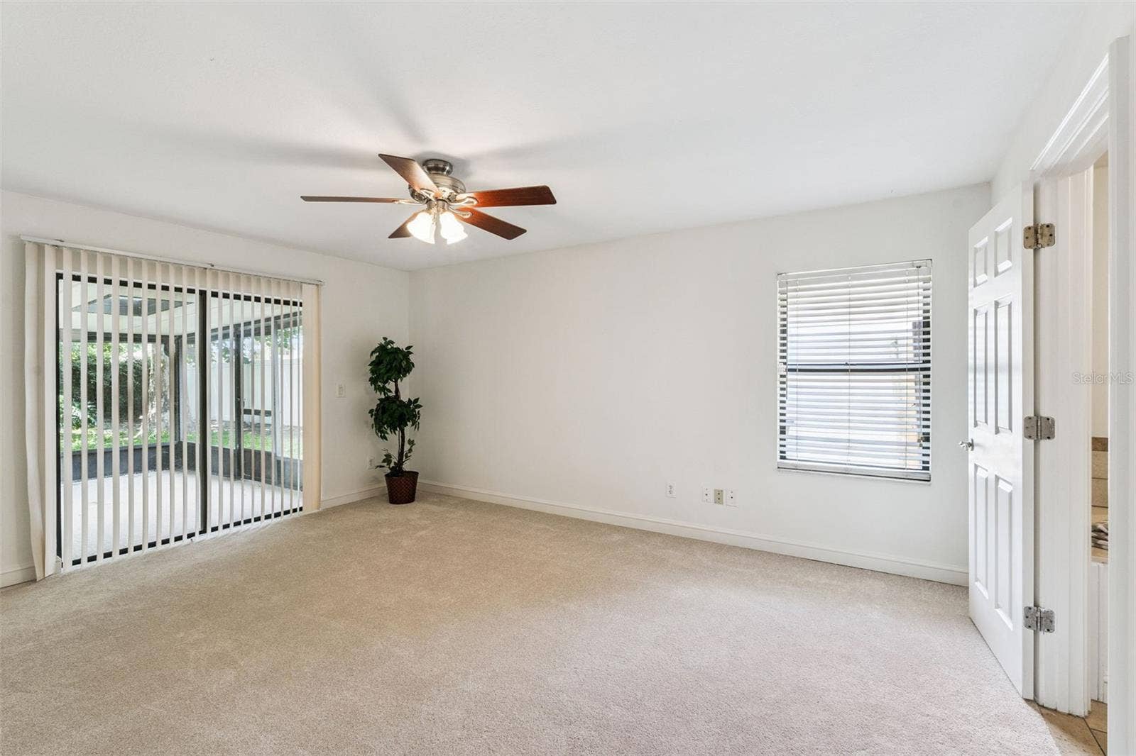 9433 PALM TREE DRIVE, Windermere, FL 34786 Primary Bedroom with Sliding Glass Doors