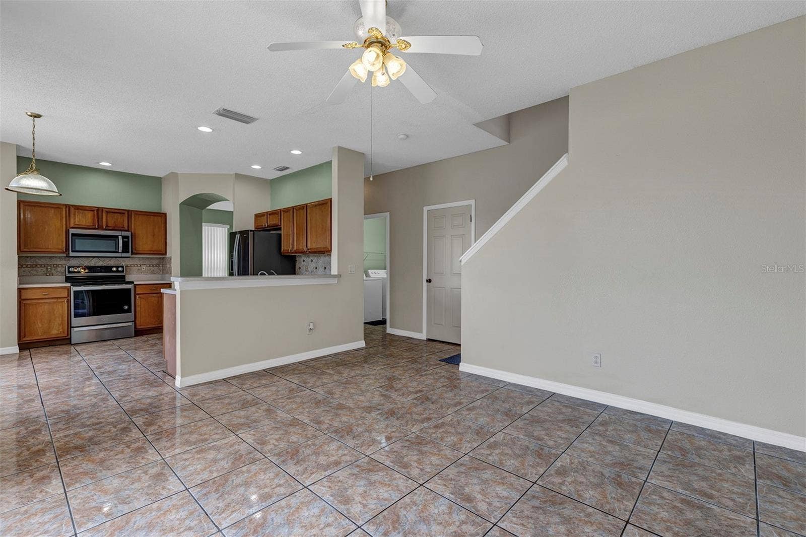 4921 CASA VISTA DRIVE, Orlando, FL 32837 Kitchen view from Family Room