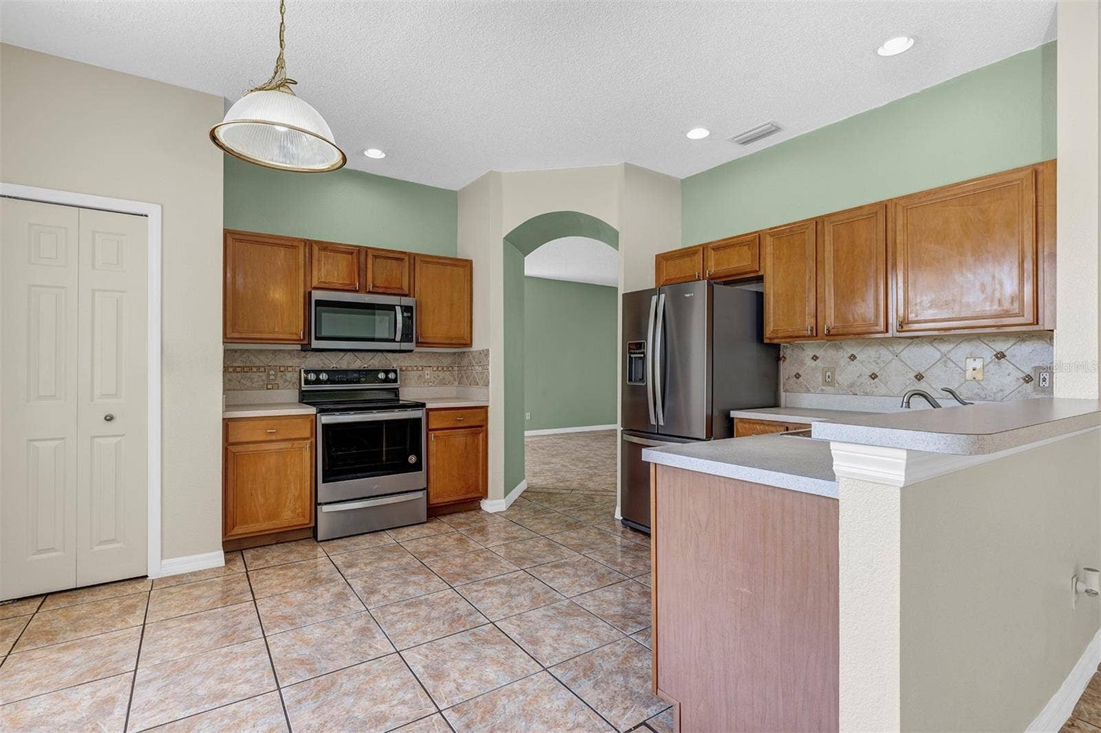 4921 CASA VISTA DRIVE, Orlando, FL 32837 Kitchen view from breakfast area