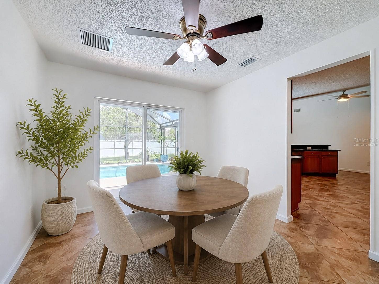 8654 ALEGRE CIRCLE, Orlando, FL 32836 Virtually Staged Dining Room