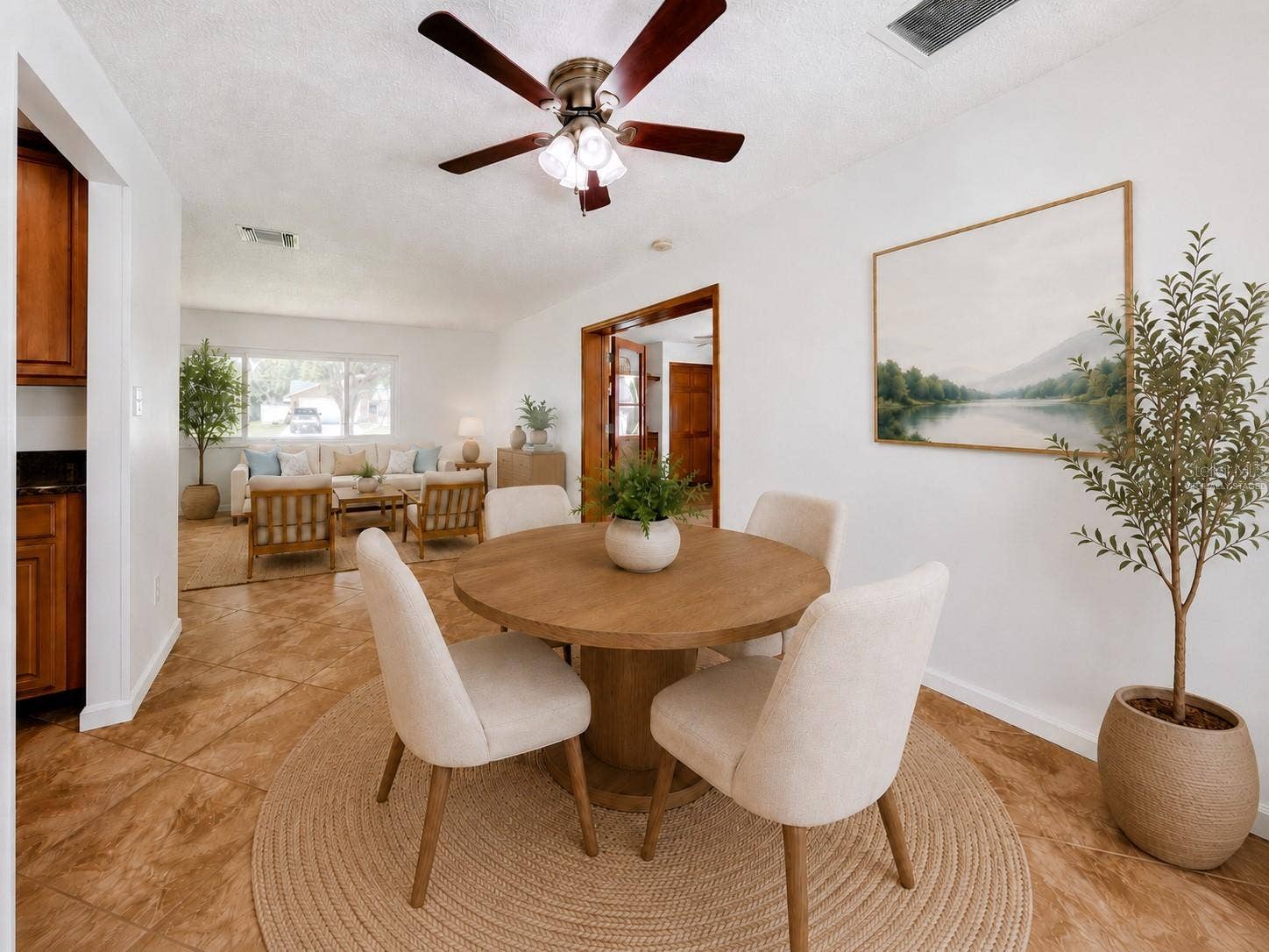8654 ALEGRE CIRCLE, Orlando, FL 32836 Virtually Staged Dining Room and Living Room/Family Room View