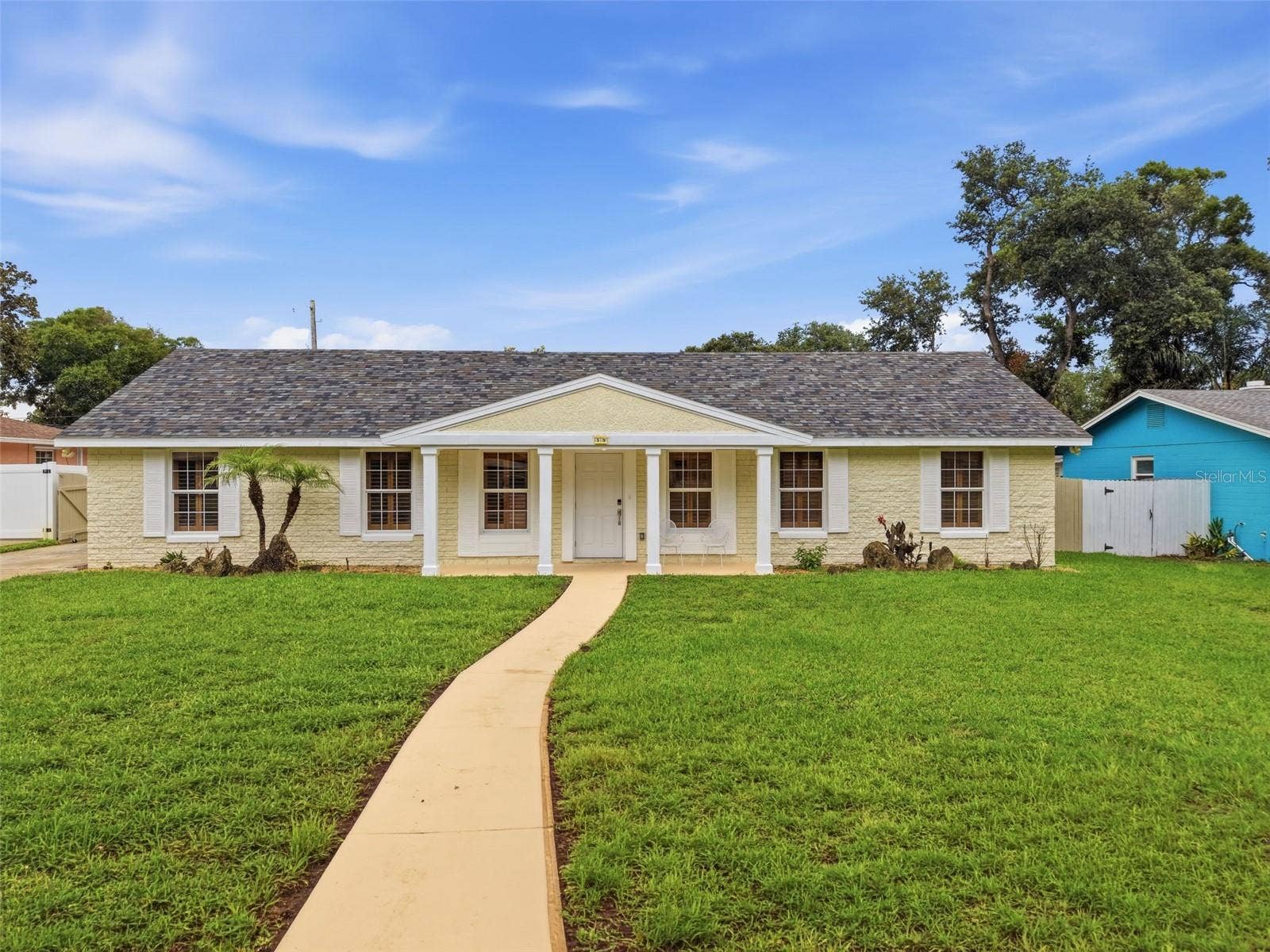 59 CRESTWOOD CIRCLE, Ormond Beach, FL 32174 Welcome home to 59 Crestwood Circlewhere timeless curb appeal meets modern Florida living.