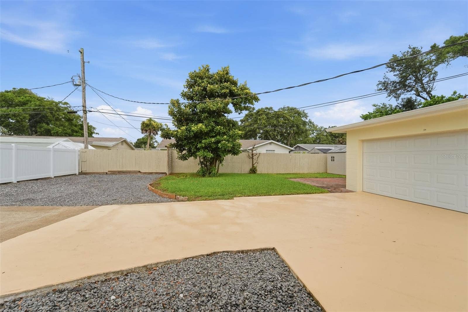 59 CRESTWOOD CIRCLE, Ormond Beach, FL 32174 Extra parking offers space for your boat, trailer, or recreational vehicles.