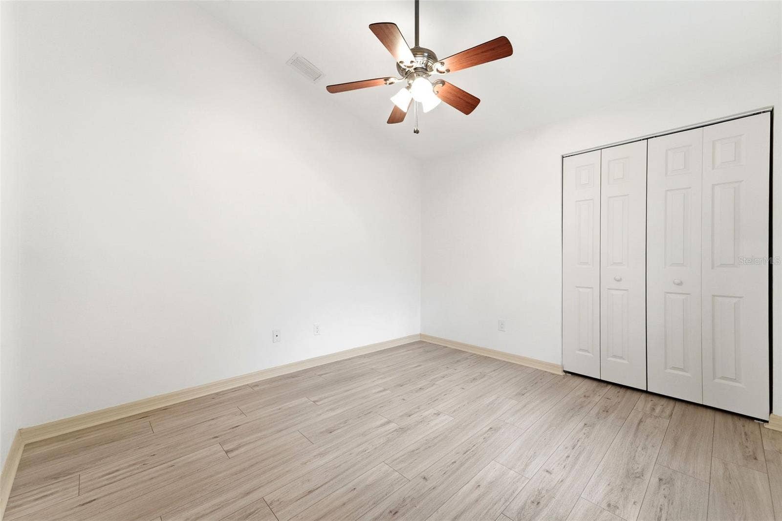 59 CRESTWOOD CIRCLE, Ormond Beach, FL 32174 Bedroom Four-Flexible space ideal for guests, hobbies, or working from home.