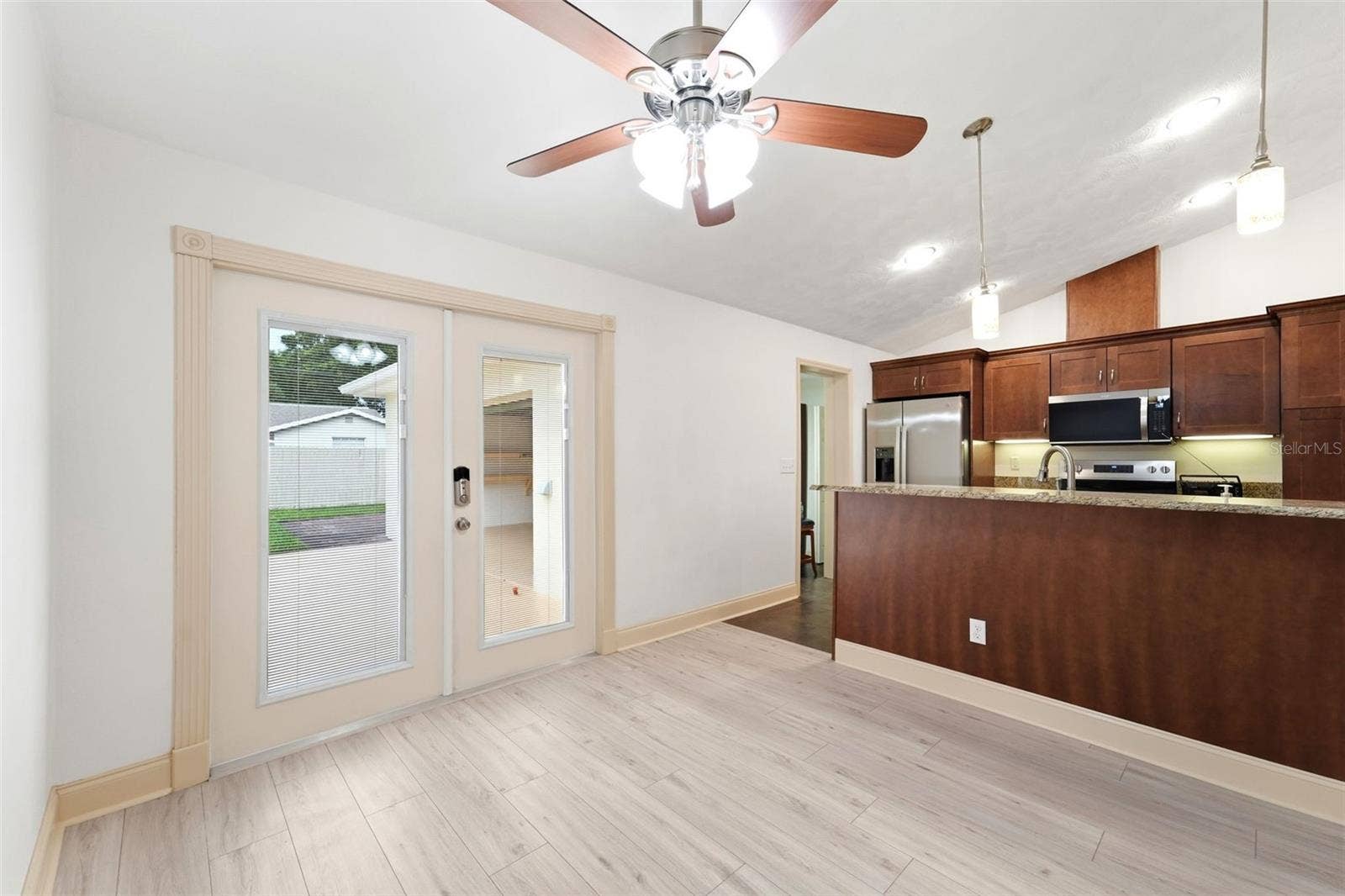 59 CRESTWOOD CIRCLE, Ormond Beach, FL 32174 A welcoming dining space that's perfect for family dinners or holiday celebrations.
