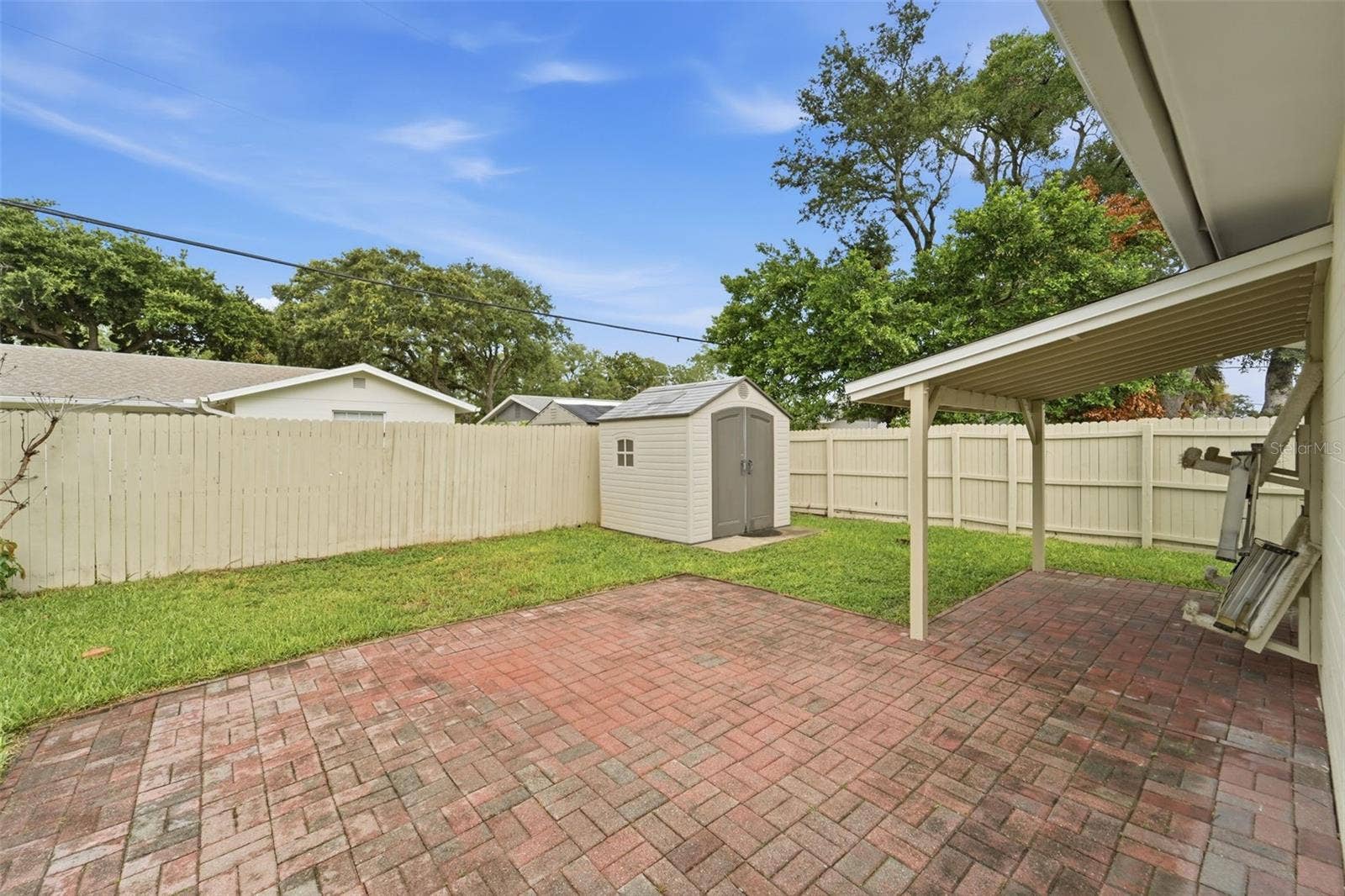 59 CRESTWOOD CIRCLE, Ormond Beach, FL 32174 Enjoy your morning coffee or evening gatherings under the covered patio.
