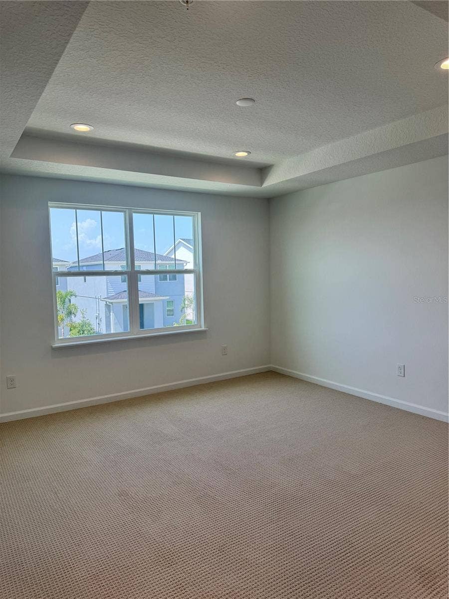 1888 CROWNCREST DRIVE, Apopka, FL 32703 Primary suite with tray ceilings