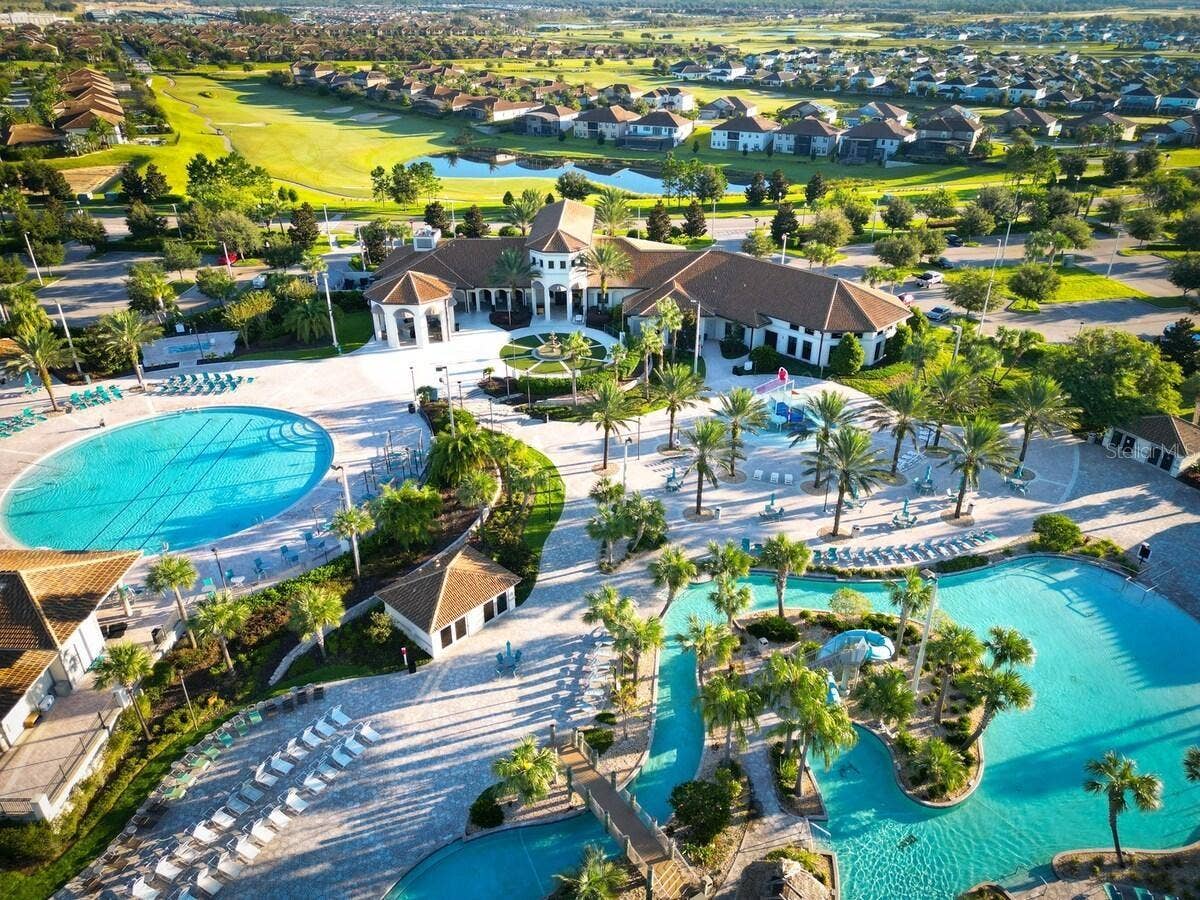 8813 BETH PAGE LANE, Davenport, FL 33896 Resort-style living at ChampionsGate! Enjoy incredible community amenities including resort pools, a lazy river, water slides, splash areas, clubhouse, fitness center, dining, sports courts and moreall designed to make every day feel like a vacation.