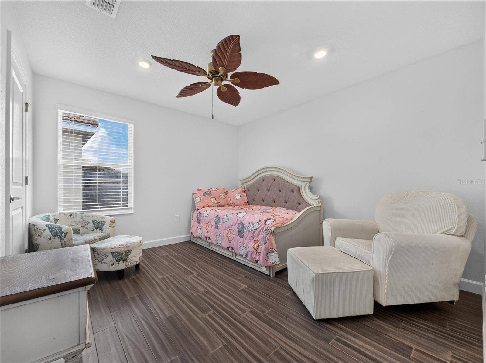8813 BETH PAGE LANE, Davenport, FL 33896 2nd level guest room with luxury vinyl flooring