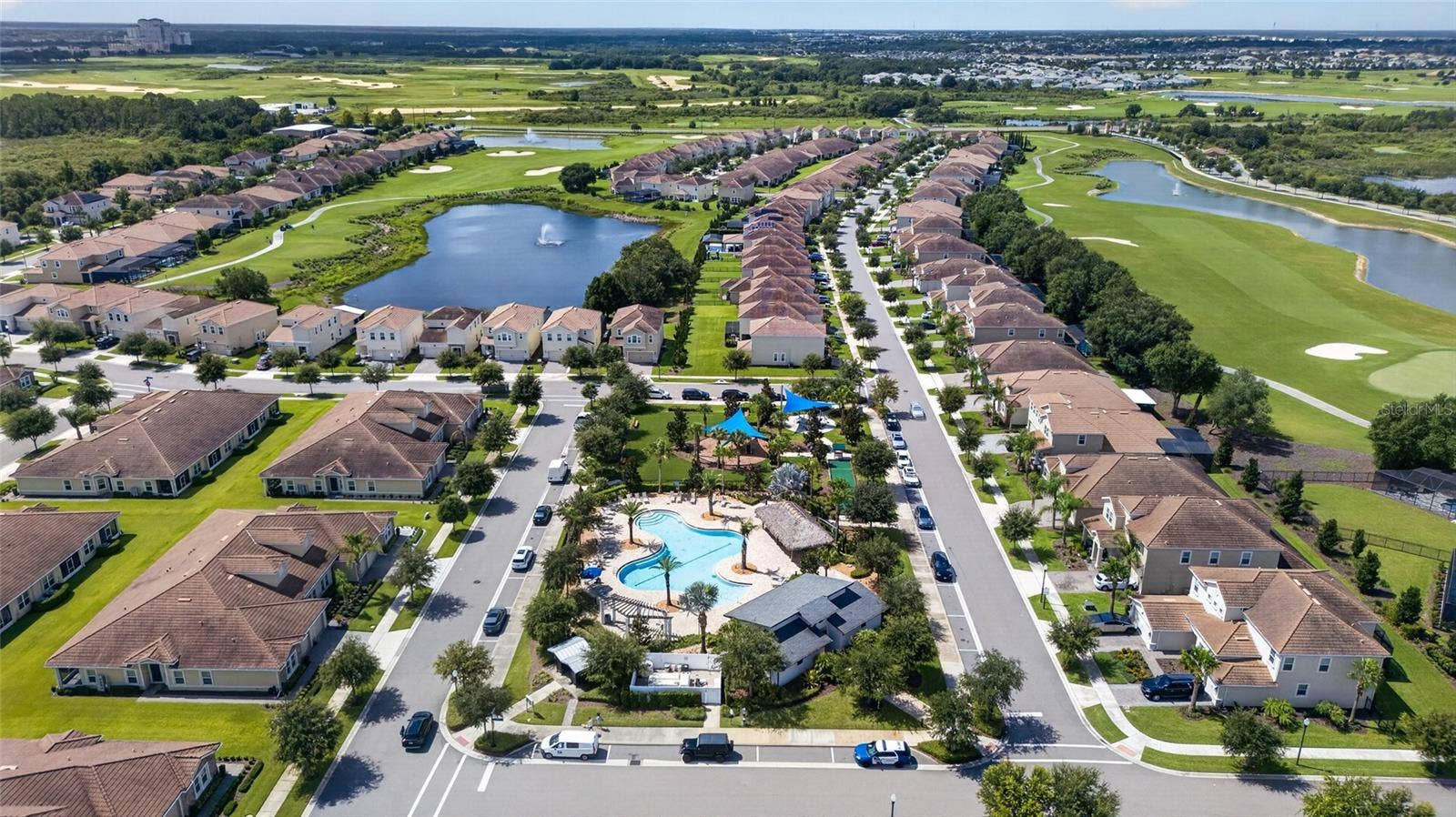 8813 BETH PAGE LANE, Davenport, FL 33896 Resort-style living at ChampionsGate! Enjoy incredible community amenities including resort pools, a lazy river, water slides, splash areas, clubhouse, fitness center, dining, sports courts and moreall designed to make every day feel like a vacation.