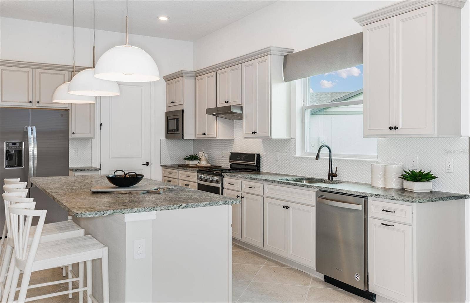 6323 DEW DROP LOOP, St Cloud, FL 34771 Model Home Design Only. Pictures and furnishings are for illustrative purposes only. Elevations, colors and options may vary. Furniture is for model home staging only.