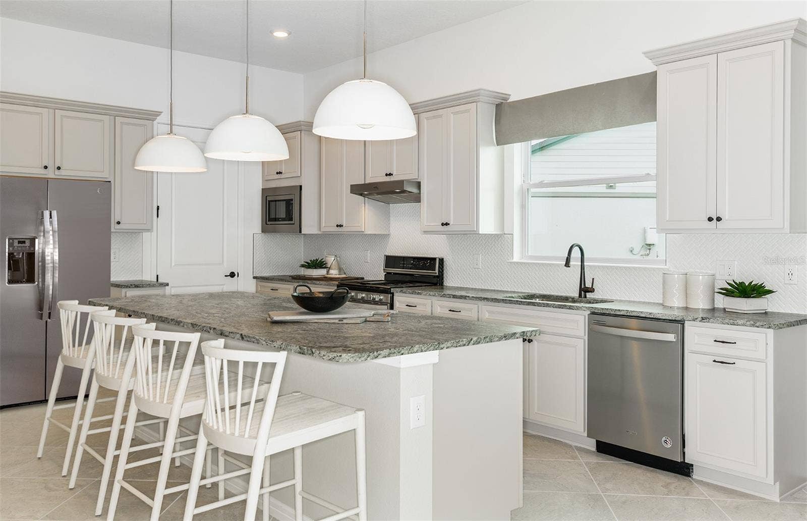 6323 DEW DROP LOOP, St Cloud, FL 34771 Model Home Design Only. Pictures and furnishings are for illustrative purposes only. Elevations, colors and options may vary. Furniture is for model home staging only.