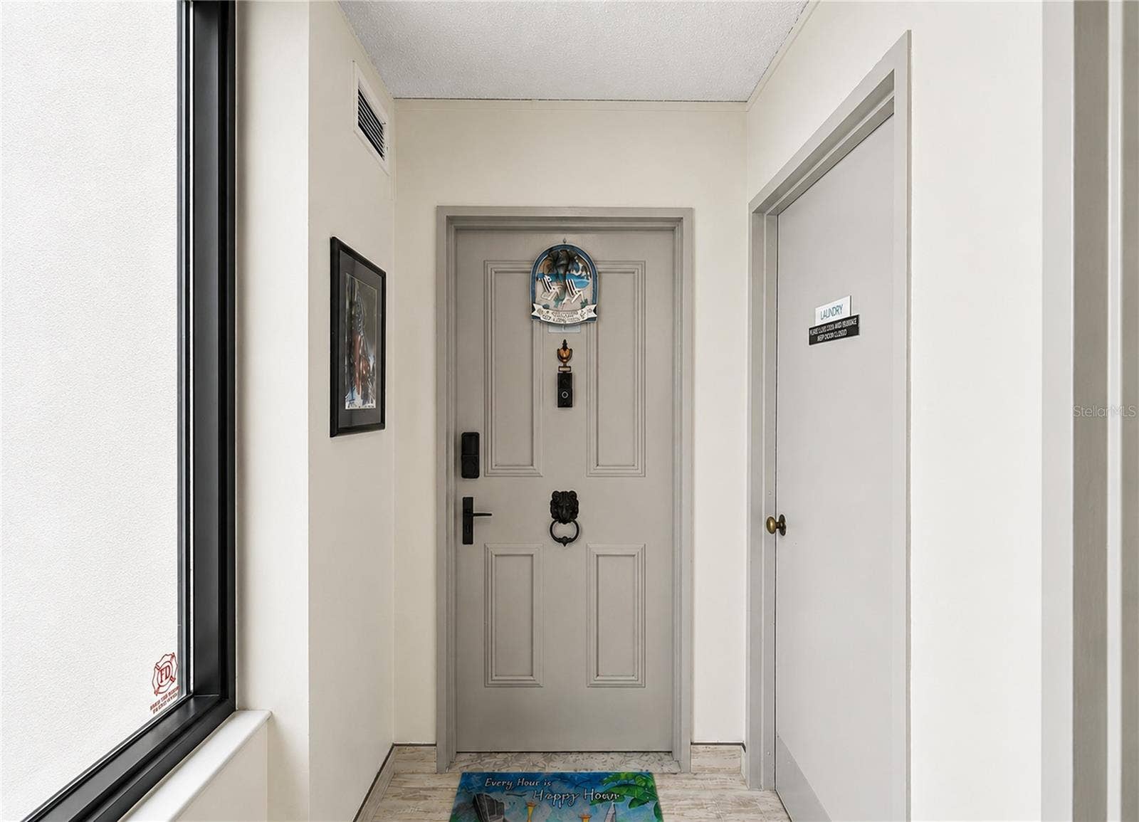 Entry way - notice the laundry room right next door.