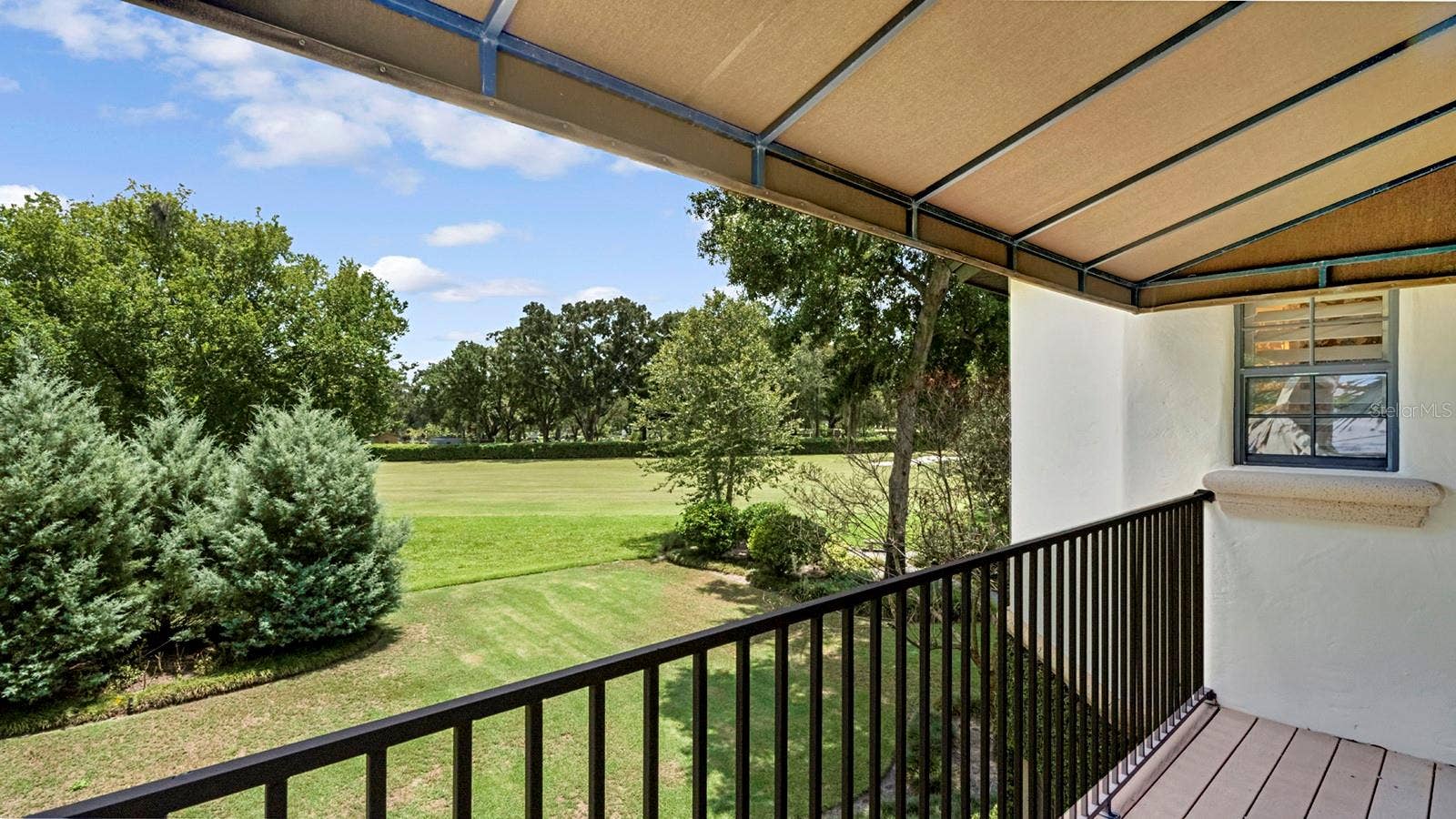 922 N PENNSYLVANIA AVENUE, Winter Park, FL 32789 Covered Balcony of Primary Suite