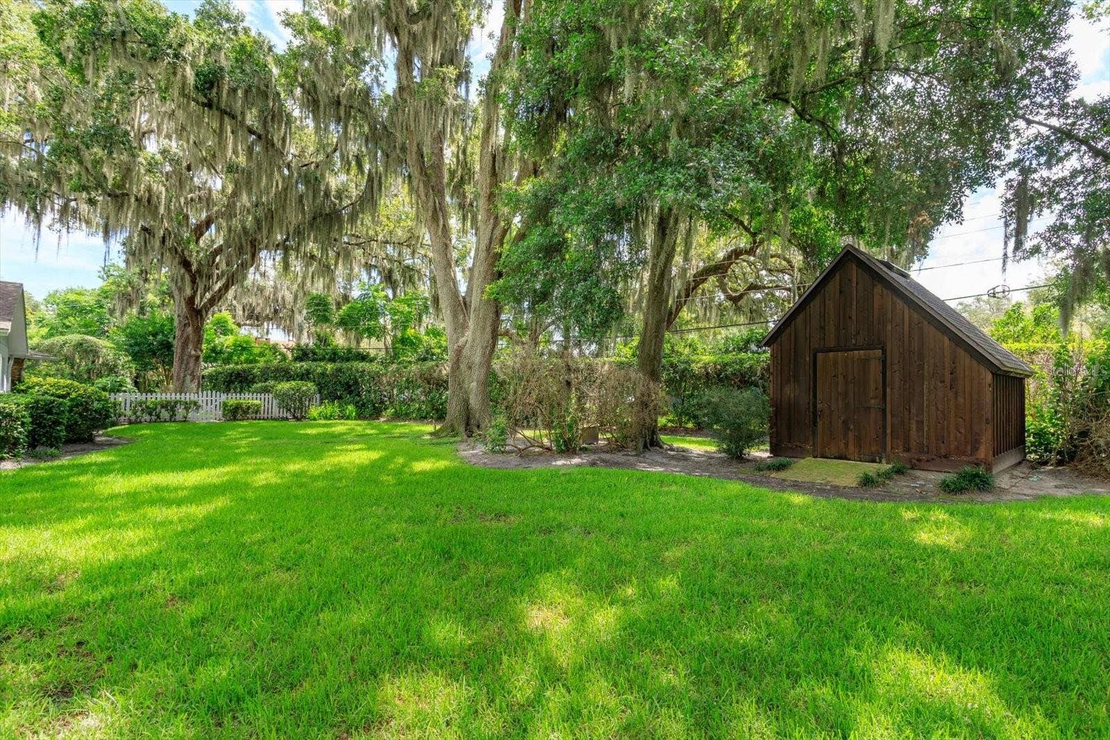 5019 GRAN LAC AVENUE, Orlando, FL 32812 Rear yard showing Garden Shed