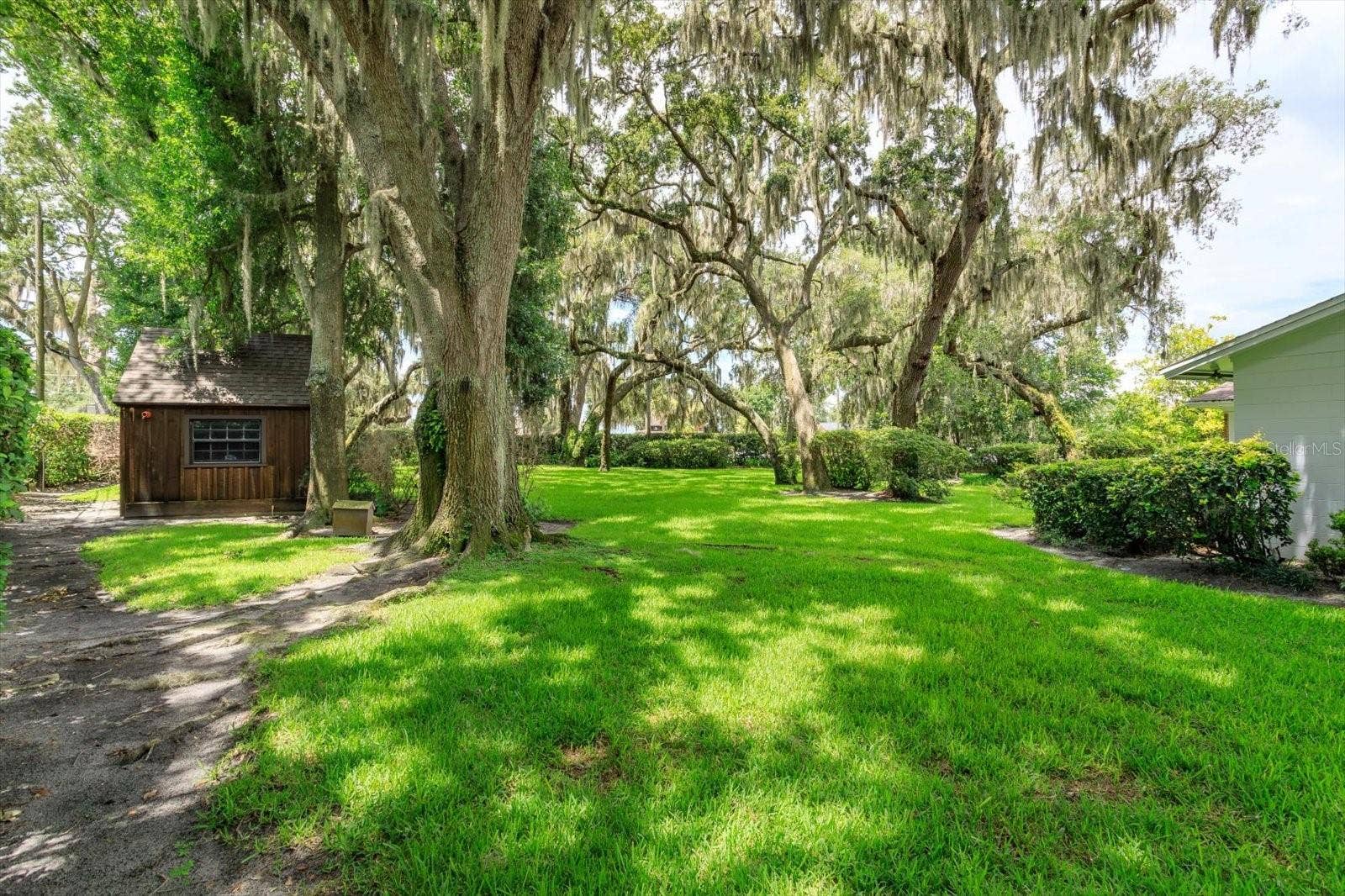 5019 GRAN LAC AVENUE, Orlando, FL 32812 Rear yard showing Garden Shed